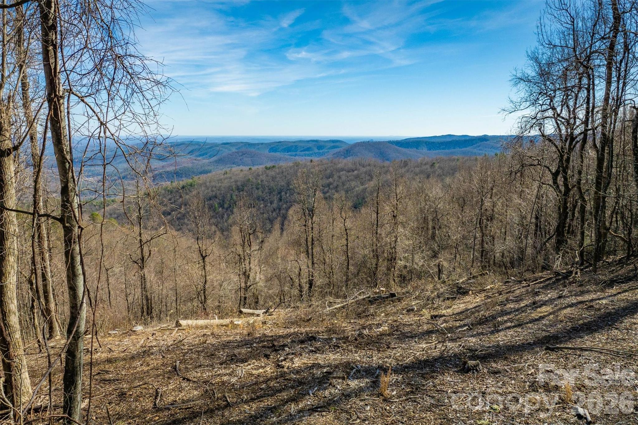 Nestled atop Burkemont Mountain, this breathtaking 3.39-acre property offers a rare opportunity to own a piece of paradise. Surrounded by the clouds, the land is mostly level, providing a great canvas for your dream home or a serene second retreat. With stunning, panoramic mountain views that stretch for miles, this is the ideal location for those seeking peace, privacy and natural beauty. Whether you’re looking to build a primary residence or a vacation getaway, this property offers just that.
