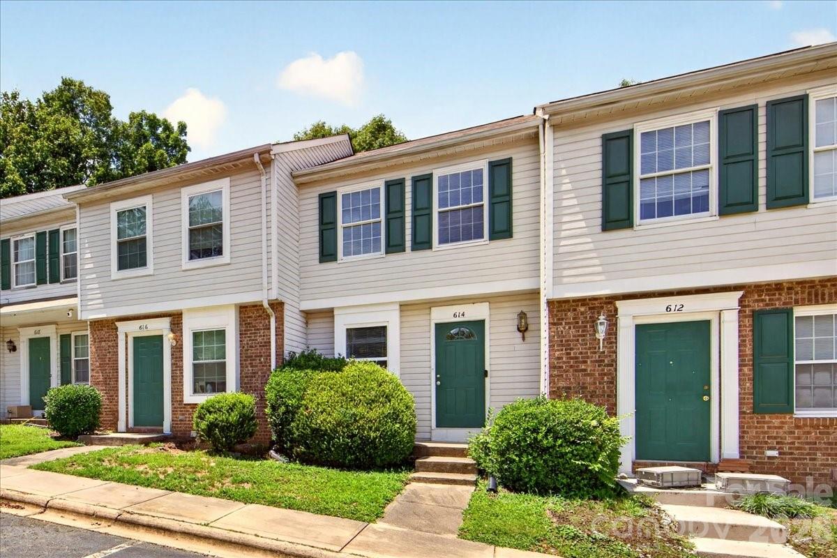 Excellent opportunity to add to your investment portfolio or set up your UNCC student with housing adjacent to the campus. This tri-level townhome also offers the chance for roommates to each have a primary living space offering privacy and a lower level separate entrance if desired. Freshly painted throughout. The main level includes foyer, a kitchen open to the adjacent dining area along with a living room with sliding door access to a private outdoor deck. The bright kitchen features painted wood cabinets, neutral counters and open sight to the adjacent dining/living area. Head to the upper level to find the first of two primary suites with a full bath plus dressing area. An additional upper level bedroom includes a large storage closet. The lower level includes a 2nd full bath with shower/tub combo, a laundry room (washer/dryer convey) along with exterior access. This lower level flex space can be a 2nd primary or used as a bonus gathering space depending on your needs. Located within walking distance to the UNCC campus, this location can't be beat. Seller has successfully rented this unit for the past 20+ years.