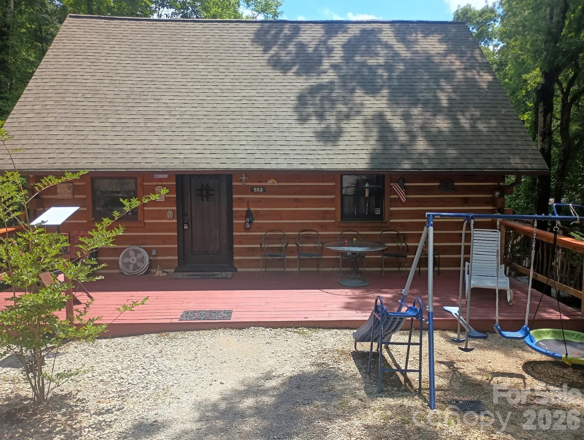Just a hop and a skip from beautiful Lake James, this unique 10-acre retreat offers unmatched privacy and direct access to nature. Bordering 38± acres of NC Wildlife Game Lands that connect to the North Fork of the Catawba River, it’s a dream come true for hunters, preppers’s, and anyone who craves an off-the-grid lifestyle while only minutes from downtown Marion. The charming log cabin is tucked deep into the woods and accompanied by multiple outbuildings for storage, workshop space, or self-sufficiency projects. A tranquil stream meanders through the property, adding to the peaceful, secluded feel. Whether you’re seeking a hunting camp, a survivalist’s haven, or a quiet escape from the world, this property delivers the rare combination of natural beauty, privacy, and proximity to Lake James.