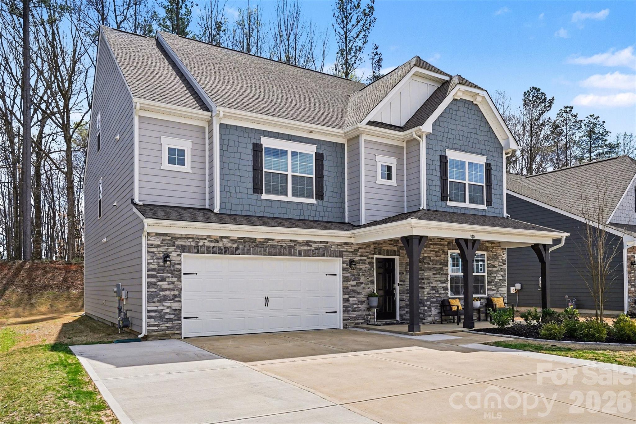 Run, don’t walk to this exceptional opportunity in Falls Cove at Lake Norman. This is the one buyers have been waiting for. Wooded lot and priced below recent appraisal, this nearly new 2024 built home offers over 4,000 square feet of beautifully designed living space with 6 bedrooms and 5.5 baths in one of the area’s most sought after communities.

From the moment you enter, the open concept main level impresses with abundant natural light and a spacious living room anchored by a gas fireplace, flowing seamlessly into a chef inspired kitchen featuring gas cooktop, double ovens, oversized island, breakfast bar, and a walk in pantry. Designed for both everyday living and entertaining, this layout checks every box.

A standout feature is the main level guest suite with its own private bathroom, offering the perfect setup for guests or multigenerational living with comfort and privacy. Additional flexible living space includes a fully finished third floor with multipurpose room, bedroom, and full bath, ideal for a private retreat, workspace, or extended living area. The upper level features an expansive primary suite with a large walk in closet and well appointed secondary bedrooms.

Situated on a wooded homesite with no home behind, this property offers rare privacy along with an extended driveway and epoxy coated garage floor. Freshly painted and meticulously maintained, this home shows like new and is completely move in ready.

This is truly one of the best values currently available in Falls Cove, and opportunities like this do not last. Preferred lender offering lender credits toward closing costs. Schedule your showing today before this home is gone.