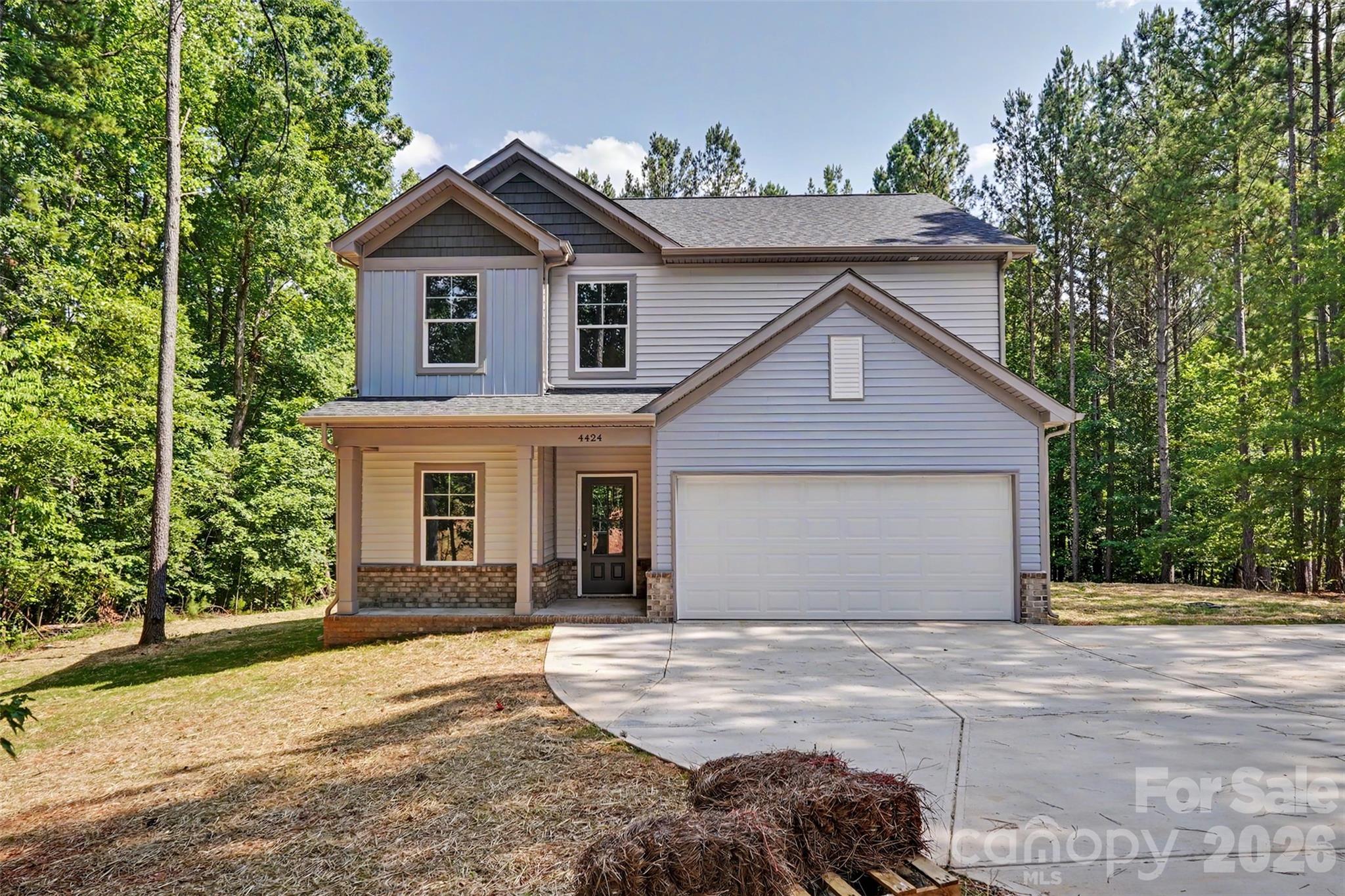 This beautifully constructed single-family home in Lincoln County offers spacious, modern living spanning 2,220 square feet on a generous 1.3-acre lot. Enjoy a private, serene setting with ample outdoor potential while maintaining easy accessibility within the Iron Station region. Home construction has recently completed with new siding, a new deck, a modern garage door, and a new well, just to name a few. Inside, you'll find a complete suite of brand-new appliances, making this property truly turn-key and ready for its next owner.