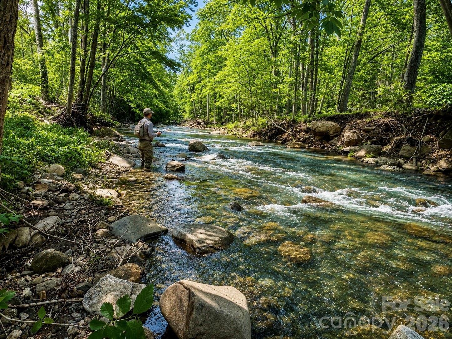 "Not all waterfront property is created equal." Fisherman’s Paradise – Rare Trout Stream Retreat-  314 feet of pristine, easily accessible frontage on Little Rock Creek, a designated Class A trout stream renowned for the Casting For Hope Fly Fishing Competition, this land becomes part of your story. Walk the entire riverbank, step straight into the shoals, deep pools and cascading rapids (30–40 feet wide), Experience a setting that invites care, commitment, and long-term thinking. Stocked by NC Wildlife, it’s a true angler’s dream and a retreat that offers meaning well beyond closing day.
Located on a paved, state-maintained dead-end road, just 4 miles to Bakersville and 25 minutes to Burnsville, the property strikes that rare balance of convenience and seclusion. The gentle topography includes a cleared, graded lot with gravel driveway and building pad—ideal for a mountain cabin, private vacation retreat, glamping setup or RV pads. A 3-bedroom septic system installed in 2022 and a strong onsite spring (awaiting connection) further enhance its value and usability. No HOA, No Restrictions, No Zoning.  
Land like this offers something few other investments can: freedom, privacy, lifestyle flexibility and the opportunity to build something lasting. Over time, it becomes a place with history, memories and meaning. In a world where so much feels temporary, this creek front retreat stands apart. Once people fall in love with land like this, they rarely look back—not because they can’t sell but because they don’t want to. In a world that moves fast and feels temporary, this is where you can put down roots—without giving up convenience. A truly rare creek front gem—Schedule a visit NOW and cast your offer—don’t miss the catch of a lifetime!
