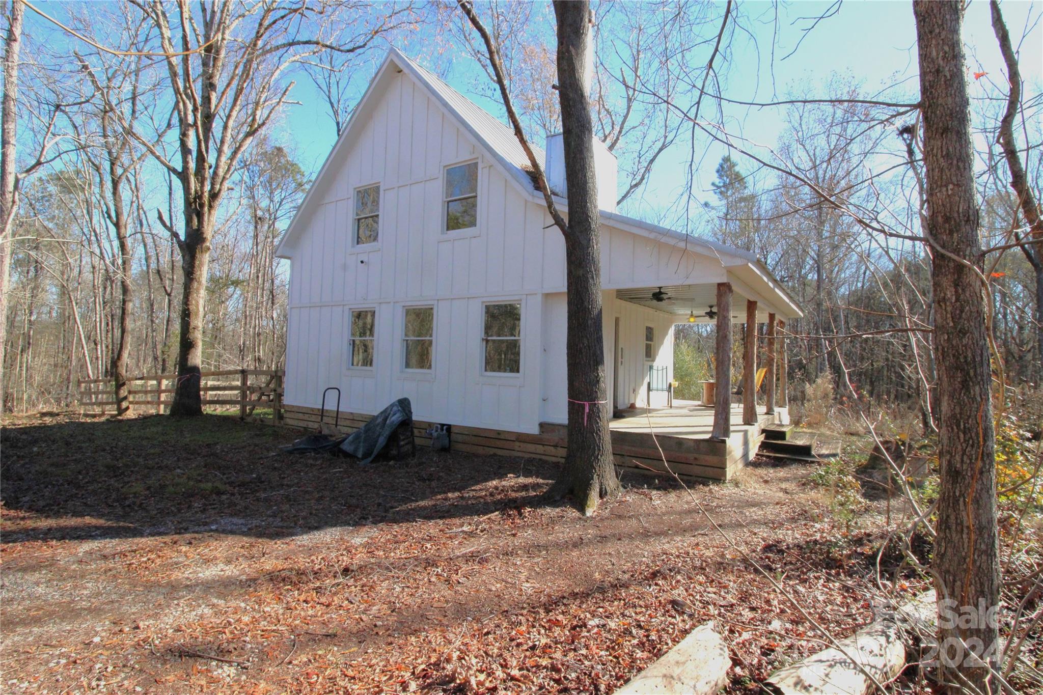 Beautiful private cabin on 13+/- acres. Charming one-bedroom, one-bathroom cabin offers a nice blend of rustic charm and modern amenities. Enjoy the warmth of the heated bathroom floors and Riannai tankless hot water heater. Relax by the wood-burning stove in the main floor living area. The kitchen features a double oven, gas cooktop, exhaust hood, and dishwasher. Outside offers a nice, fenced backyard, outdoor shower and covered front porch. The property touches Chester State Park, providing easy access to other outdoor activities.  The property has a level terrain with gentle rolling topography. Recent timber cutting offers the opportunity to make this land your own. This private cabin is a rare find, perfect for a second home or permanent residence. Property is being sold AS IS.