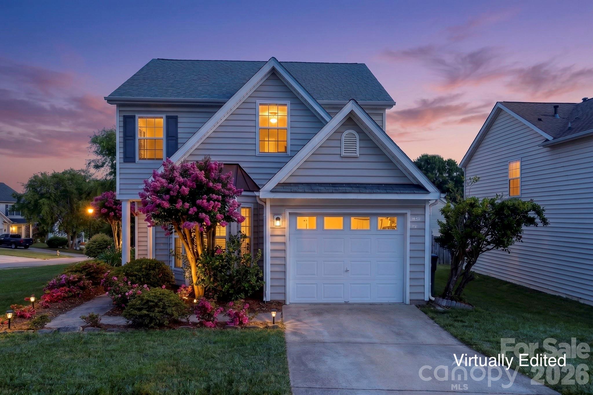 Move right into this beautifully refreshed home located on a spacious corner lot within the vibrant Waterstone community. Rest easy knowing that major updates were completed in 2024, including new plumbing throughout, a new HVAC system, and modern flooring. The bright kitchen features granite countertops, subway tile, a newer dishwasher, and a handy breakfast bar, flowing easily into the living room highlighted by soaring ceilings and a cozy fireplace. The main-level primary suite offers a true escape, with a bath featuring dual sinks, a garden tub, and a separate tiled shower. Convenience is key with the large walk-in primary closet providing direct access to the laundry room, where the washer and dryer convey. Upstairs, you will find two additional bedrooms, full bathroom, and a flex space perfect for an office, a play room, or guests. Enjoy the upcoming summer from your own yard with mature blueberry bushes ready for picking in June, or take advantage of the unbeatable community amenities, including a pool, playground, and basketball court. All of this is situated in the top-rated Fort Mill school district, close to shopping and the interstate, with trash and recycling included in the HOA.