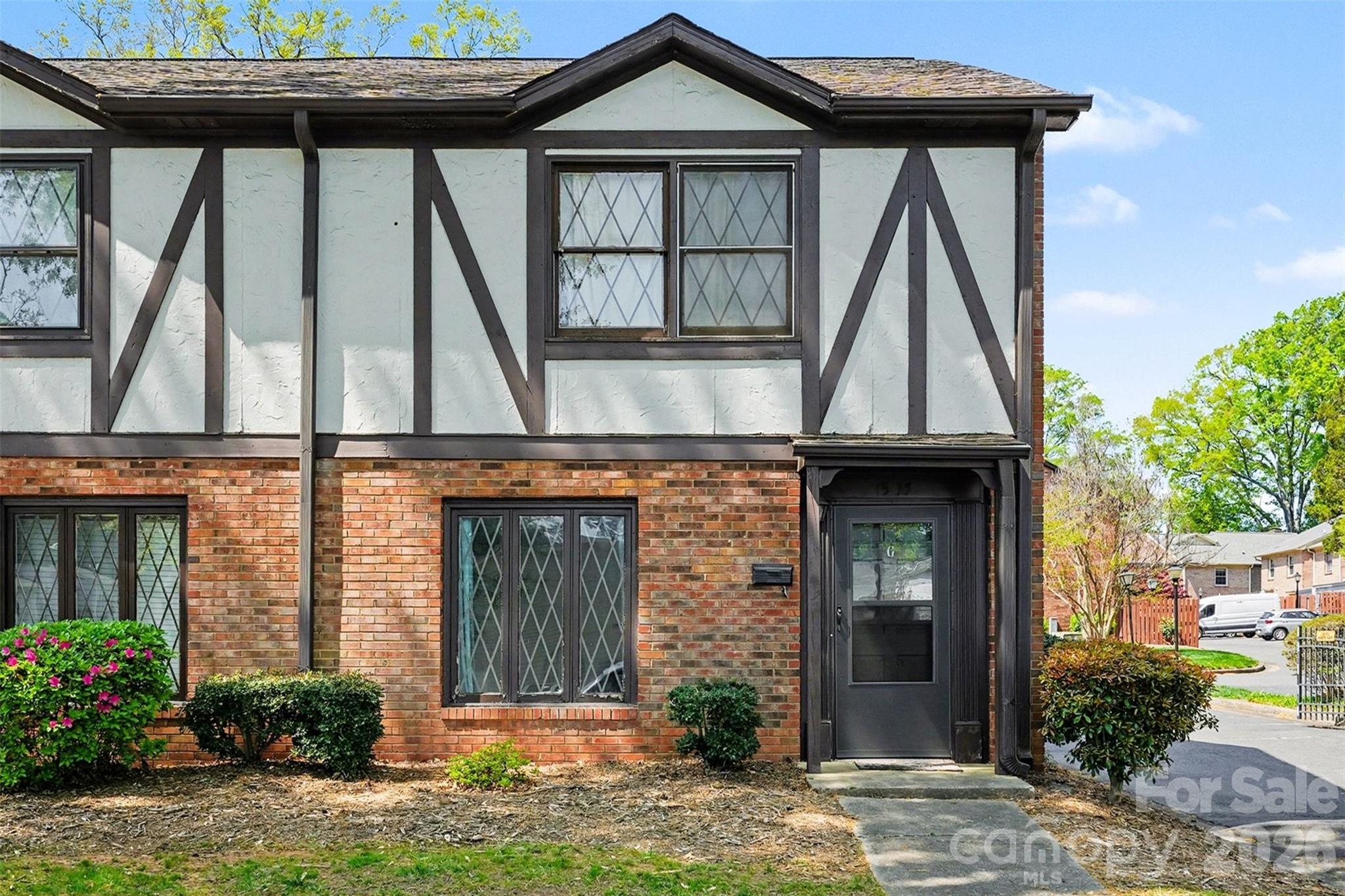 Great for Investors or first time home buyers! Welcome to this two-story, 2-bedroom, 1.5-bathroom condo located in the highly desirable The Oaks neighborhood—just minutes from Uptown and Plaza Midwood! This is a fantastic opportunity to personalize and make this space truly your own. Inside, you’ll find a functional layout with both bedrooms and a full bathroom upstairs. The main level features a kitchen, convenient laundry area, spacious great room, and a half bath for guests. Enjoy the outdoors with a privately fenced patio—perfect for relaxing or entertaining. There’s also an attached outdoor storage unit for added convenience. Don’t miss out on this great combination of location, comfort, and potential. Welcome home!