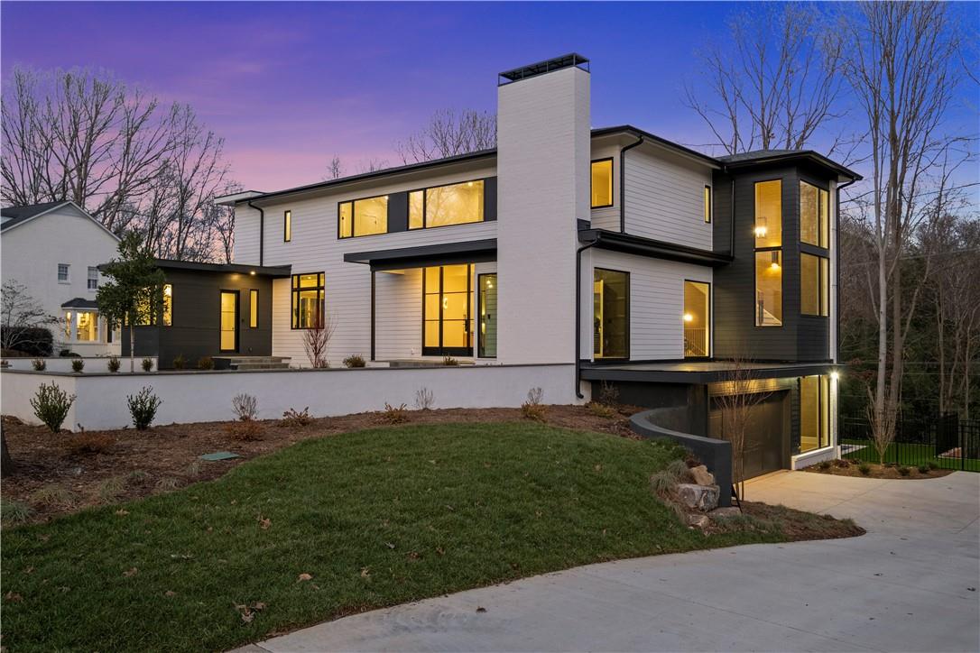 Spectacular 5 bed, 5.1 bath Foxcroft new construction home with pool designed by Greg Perry and built by Joyce Building Co. High-end designer finishes throughout. Upon arrival a motor court & impressive steel door welcomes you into the home. An abundance of dramatic windows throughout allow the lot's private, wooded setting to be masterfully incorporated into the interior feel of the home. Top of the line gourmet kitchen features beautiful custom cabinetry, large center island, quartz countertops, Wolf and subzero appliances, two dishwashers and a large scullery/pantry. Kitchen opens to a gracious family room surrounded by windows. Covered outdoor porch with fireplace overlooks pool. Handsome study on main. Gorgeous primary bedroom w/ spa-like bathroom & spacious custom closet. Three secondary bedrooms up with en suite bathrooms. Huge walk out basement has tall ceilings, bar, bonus room & private guest suite. Close proximity to neighborhood swim/tennis club. A pleasure to show!