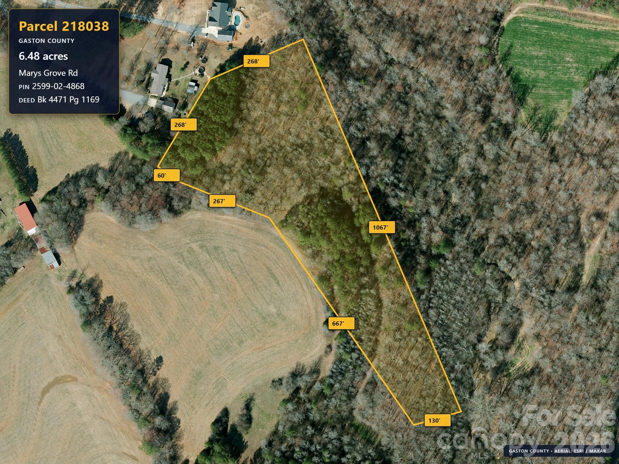 This 6.48 acres is located in rural Gaston County, just off Mary's Grove Road.  There is an easement from Mary's Grove Road to the subject property.  The right-of-way is not cleared to the property.  It is clear a portion of the way from Mary's Grove, but not to the subject property.  Well and septic are required.  No permits or soil testing have been done.  Mary's Grove Road is a paved state-maintained road.  The right-of-way drive is private and privately maintained with gravel.
