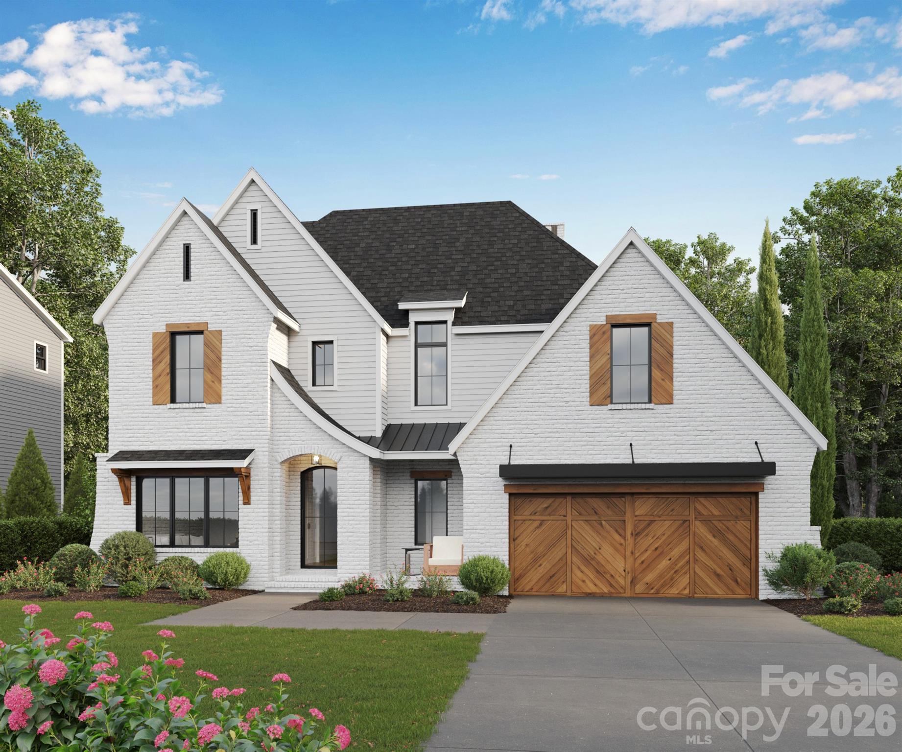 EXCLUSIVE GRAND OPENING CELEBRATION • JULY 18 • RECEIVE AN ADDITIONAL $130,000 IN EXCLUSIVE GRAND OPENING SAVINGS — ONE DAY ONLY! Introducing The Estates at Rea Farms.

An exclusive GATED enclave of only seven fully customizable luxury residences by Grand Living Homes, where timeless architecture, exceptional craftsmanship, and an unmatched walkable lifestyle converge in one of South Charlotte's most coveted addresses.

Perfectly positioned in the heart of South Charlotte, this extraordinary boutique community offers an unparalleled lifestyle with walkable access to Life Time Fitness, Whole Foods Market, The Porter's House, Little Mama's, YAMA Sushi, boutique shopping, & more than 35 premier restaurants, cafés, and entertainment destinations throughout Rea Farms & Waverly.

Residents enjoy the convenience of true lock-and-leave luxury living within an intimate boutique community while remaining just minutes from SouthPark, Ballantyne, Uptown Charlotte, Charlotte Douglas International Airport, & many of the region's top private schools.

Thoughtfully designed to blend striking contemporary architecture with timeless livability, The Montclair D offers an exceptional balance of elegance, functionality, and effortless luxury. The expansive open-concept floor plan is highlighted by soaring ceilings, dramatic walls of glass, and beautifully curated living spaces filled with abundant natural light, creating a home equally suited for grand entertaining and comfortable everyday living.

At the heart of the home, the designer chef's kitchen combines sophisticated style with exceptional functionality, featuring an oversized statement island, premium appliance package, designer cabinetry, abundant prep space, & the option to incorporate a private scullery for additional preparation, storage, and effortless entertaining.

The adjoining great room& dining area flow seamlessly onto an expansive covered terrace through oversized sliding glass doors, creating an exceptional indoor-outdoor lifestyle ideal for year-round entertaining, relaxing, & enjoying the beauty of your surroundings.

The luxurious owner's retreat provides a peaceful sanctuary complete with a spa-inspired bath featuring a freestanding soaking tub, oversized walk-in shower, dual vanities, & generous custom closet space. Spacious secondary bedrooms are thoughtfully positioned for maximum privacy and comfort, each complemented by beautifully appointed ensuite baths.

One of The Montclair D's signature features is its expansive third-level retreat, offering exceptional flexibility to create a media lounge, golf simulator, fitness studio, executive office, private guest suite, or the ultimate entertaining space designed around your lifestyle.

A private elevator is included as a standard luxury feature, providing effortless access to every level while enhancing convenience, accessibility, &long-term livability.

The Estates at Rea Farms represents one of South Charlotte's most limited luxury new home offerings. Buyers who secure a homesite before construction begins will enjoy the rare opportunity to collaborate with Grand Living Homes to personalize floor plans, architectural details, designer finishes, and outdoor living space reating a residence that is uniquely their own.

Whether you're searching for a primary residence, executive retreat, or an elegant lock-and-leave home, The Montclair D delivers an extraordinary combination of timeless architecture, exceptional craftsmanship, unmatched walkability, and personalized luxury in one of Charlotte's most desirable addresses.

Join us for our Exclusive Grand Opening Celebration on July 18 and receive an additional $130,000 in exclusive Grand Opening savings available for one day only. This is a rare opportunity to secure one of South Charlotte's most coveted luxury homes before this exclusive collection is sold out. Schedule your private tour today and begin creating a home designed exclusively for you.
