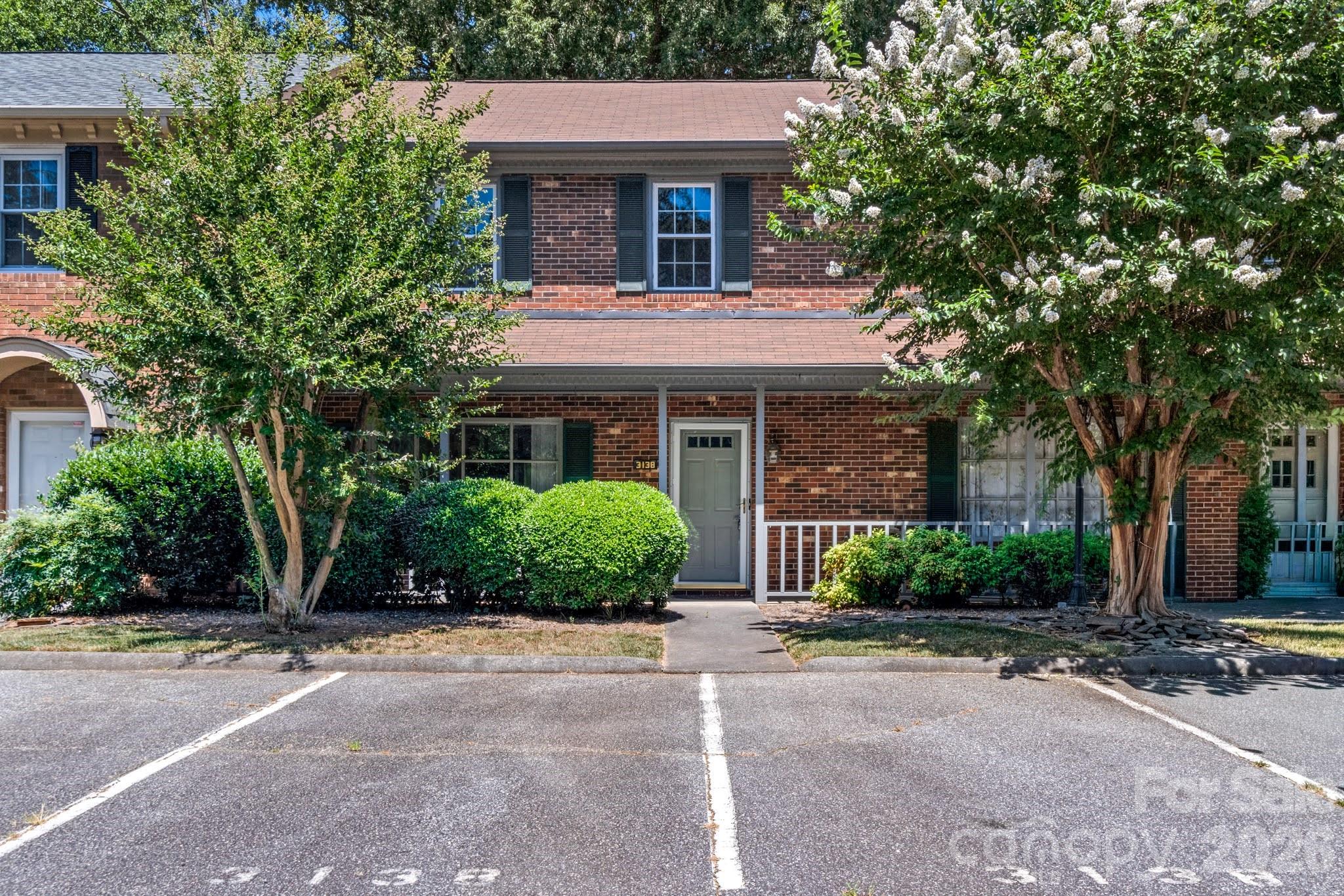 Just Listed!  Discover this meticulously maintained, one-owner gem which is move-in ready and features valuable updates that you won't want to overlook.  Recent luxury vinyl flooring flows seamlessly throughout the spacious main living area, complemented by a large, open kitchen with updated countertops and fresh paint. The great room, featuring a cozy wood-burning fireplace, opens directly onto a tranquil, privacy-fenced patio.  The upper level boasts two generously sized bedrooms, each equipped with its an ensuite bathroom. The primary bedroom includes a walk-in shower and two closets for ample storage. Notable updates include a new roof installed in 2022 and a new heat pump in 2023! Enjoy unbeatable convenience with proximity to local shopping centers, top-tier medical facilities, and popular restaurants. The HOA dues cover water & sewer, common area, streets & access to the community pool!