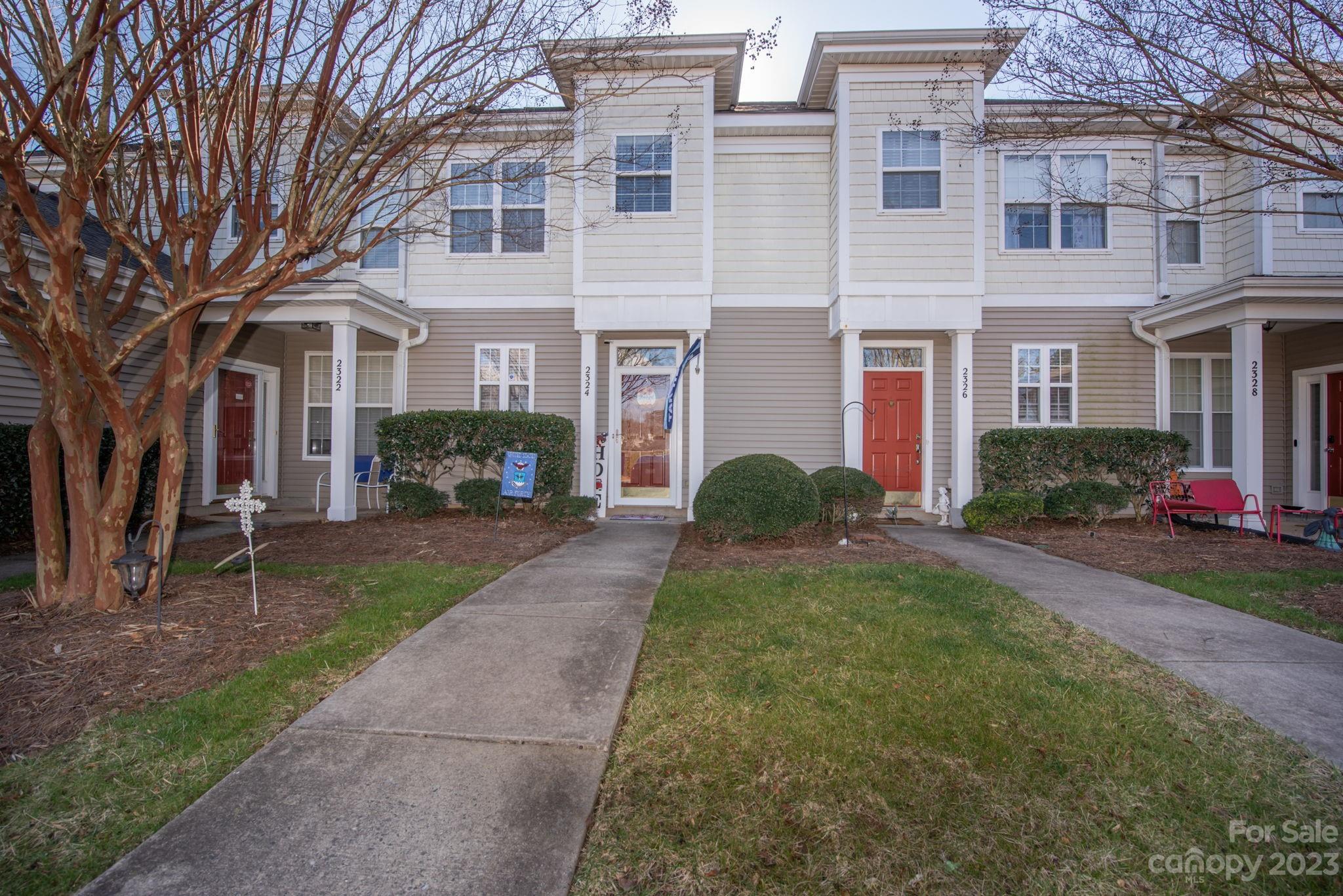 Very well-maintained, move-in ready townhouse in the Madison Green community. Kitchen, dining area and living room with gas logs and built-in cabinetry are located on the main level. Step out onto the screened in patio to enjoy some fresh air while you have your morning coffee or evening beverage of choice. Upstairs you will find the laundry closet, and pull-down attic access that leads to plenty of floored space for storage, both bedrooms each with an ensuite bathroom and the primary has a walk-in closet. Refrigerator, washer and dryer will convey. Per sellers- in 2021 the AC unit was replaced and a tankless gas water heater was installed. The built-in microwave was replaced within the past three months. Community features a dog park, clubhouse and pool for residence to enjoy.