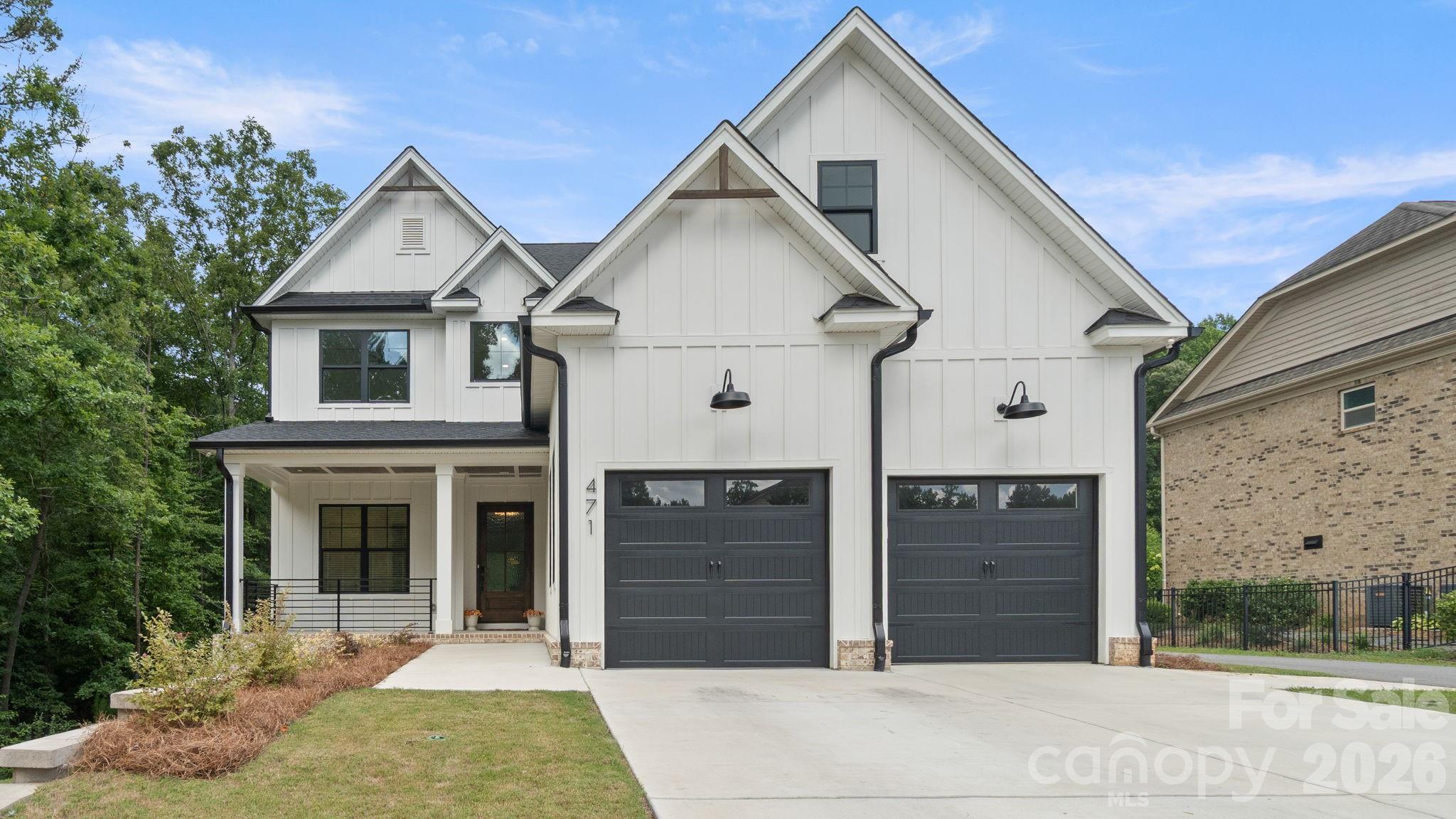 Experience luxury living in this stunning custom-built home in the highly sought-after gated community of Kimbrell Crossing, located just minutes from the heart of downtown Fort Mill. Only one year old, this exceptional residence offers 5 spacious bedrooms, 4.5 bathrooms, and an impressive collection of high-end upgrades throughout.
Designed with both elegance and functionality in mind, the open floor plan showcases designer finishes, premium craftsmanship, and luxurious details at every turn. The gourmet kitchen flows seamlessly into the spacious living and dining areas, creating the perfect setting for entertaining or everyday living.
Step outside to your oversized screened porch featuring a beautiful outdoor fireplace—the perfect place to relax year-round while enjoying the privacy of your fully fenced backyard. One of this home’s most unique features is its incredible setting. The property beside the home will never be built on, providing a permanent wooded buffer along the side, while mature trees behind the home create an equally peaceful and private backdrop.
With the feel of a custom estate, an unbeatable location near shopping, dining, and award-winning Fort Mill schools, and nearly new construction without the wait, this home is a rare opportunity you won’t want to miss.
