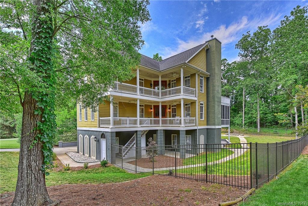 Lovely Charleston style home on large, private lot with view of trees! Three floors of Southern Living, w/ bedrooms on all levels!  Updated kitchen with granite, gas cooktop, ss & large pantry! Master suite has fireplace & master bath is to die for.  Don't miss the oversized master closet! Lower level great for recreation & offers a  wet bar for entertaining! Enjoy the outdoors w/ multiple decks, porches, & screened in porch! Established neighborhood with plenty of trees! Low HOA! Great Location