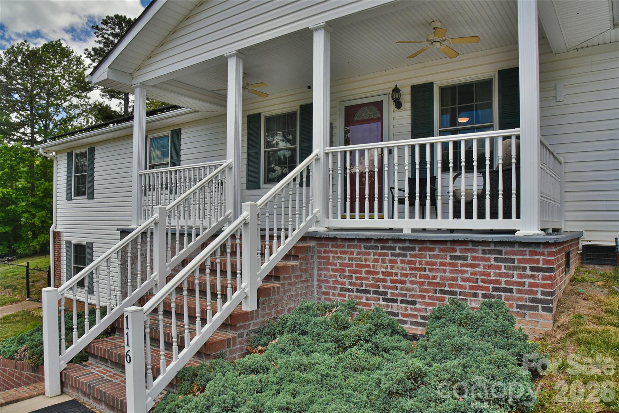 Tucked away on over an acre in Flat Rock, this custom-built home offers mountain views, peaceful surroundings, and easy access to Hendersonville, I-26, shopping, and dining. Designed for comfortable one-level living, the home features a bright, functional layout with spacious living areas and quality finishes throughout.

The main level includes hardwood floors, an inviting living room, a dedicated dining space, and a well-appointed kitchen with pantry storage and nearby laundry. The primary suite provides a relaxing retreat, while two additional bedrooms offer flexibility for guests or hobbies. Built-in shelving and storage solutions throughout the home add both character and practicality.

The partially finished lower level expands the living space with a versatile bonus area, exterior entry, and ample room for storage, projects, or recreational use. An attached two-car garage adds even more convenience. Solar panels installed in 2020 help improve energy efficiency.

Enjoy the outdoors from the covered front porch, back deck, or fire pit area overlooking the level yard and surrounding mountain scenery. Combining privacy, usable land, and a convenient location, this property offers the best of Western North Carolina living.
