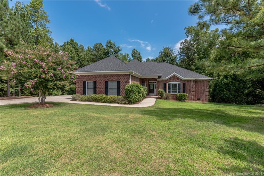 Indian Land beauty on an acre in well desired Millstone Creek. Beautiful hardwood flooring throughout the entire downstairs. Grand ceilings. Office and large laundry room. Imagine sitting on large screened porch made from red wood overlooking the private backyard enjoying nature. New schools in Indian Land will be very close to Millstone Creek.
