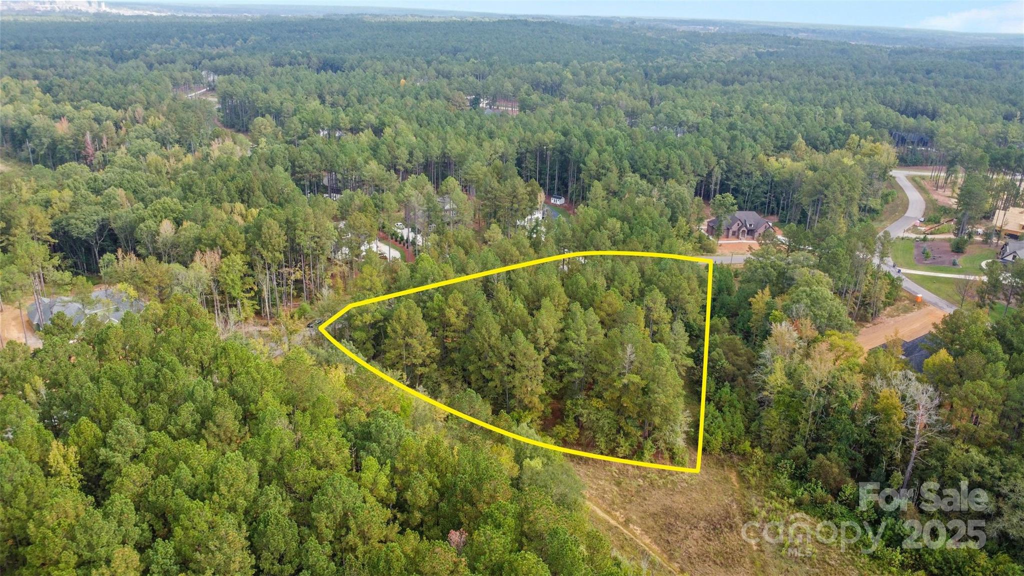 Discover an incredible opportunity in the sought-after Riverchase community with this rare double lot spanning 1.48 acres. Offering both privacy and presence, the expansive road frontage sets the stage for a grand entrance to your future dream home. An approved septic design for up to five bedrooms is already in place, making the building process smoother and more efficient.

Riverchase Estates is more than just a neighborhood - it’s a lifestyle. Residents enjoy gated security, a private clubhouse, fitness center, resort-style pool, tennis courts, and miles of scenic walking trails. Outdoor enthusiasts will love the nearby access to the Catawba River, while shopping and dining are just a short drive away. With no required timeline to build, you can take your time crafting the perfect home with your preferred builder. Embrace the balance of natural beauty, convenience, and community in this premier location.