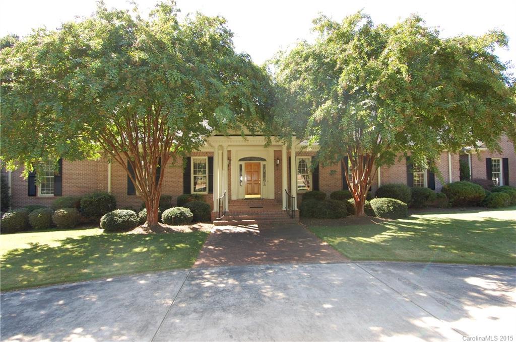 Stunning Full Brick Ranch Home Located on Fort Mill Golf Course! This sprawling manor overlooks the 4th fairway! Step inside this custom built home w/ oak hardwood flooring & many custom features! Open kitchen w/ custom built cherry cabinets! Amazing sunroom overlooking golf course! The master suite boasts dual bathrooms! large secondary bedrooms! Formal living & dining rooms that are perfect for entertaining! This home will not last long! Office/Study could be used as 4th bedroom!