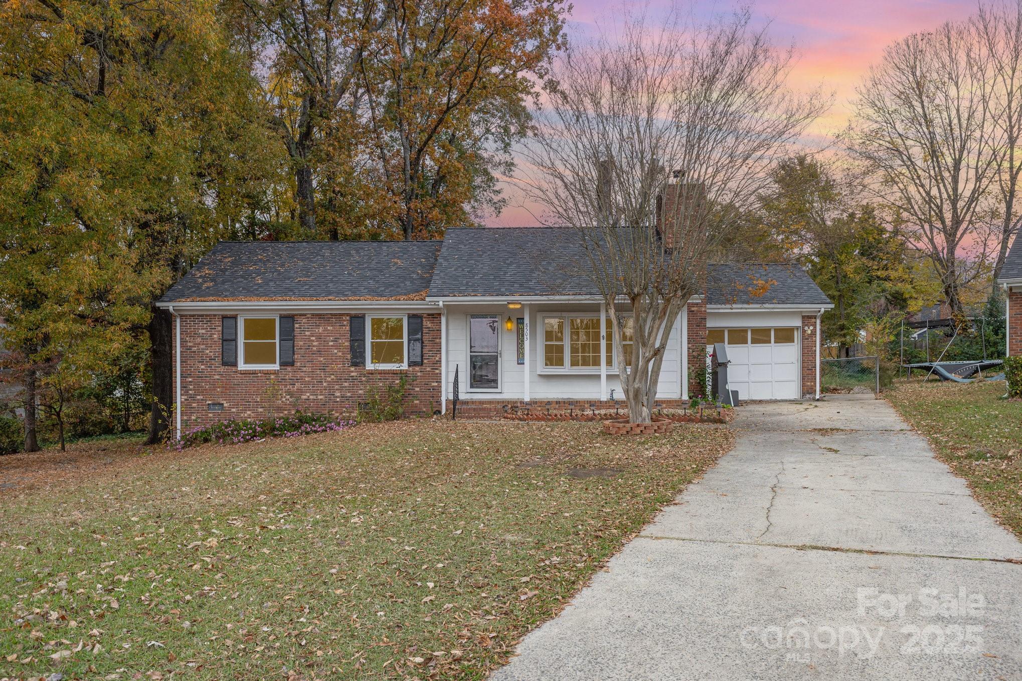 This beautifully maintained 3-bedroom, 1.5-bath home is tucked away on a peaceful cul-de-sac with no HOA — offering comfort, privacy, and convenience. Inside, you’ll find a bright open layout with updated flooring, fresh paint, and an upgraded kitchen featuring modern appliances. The home also includes a covered deck overlooking a spacious, fenced backyard — perfect for relaxing or entertaining. This truly move-in-ready home blends quality updates with cozy charm — a must-see in East Charlotte!