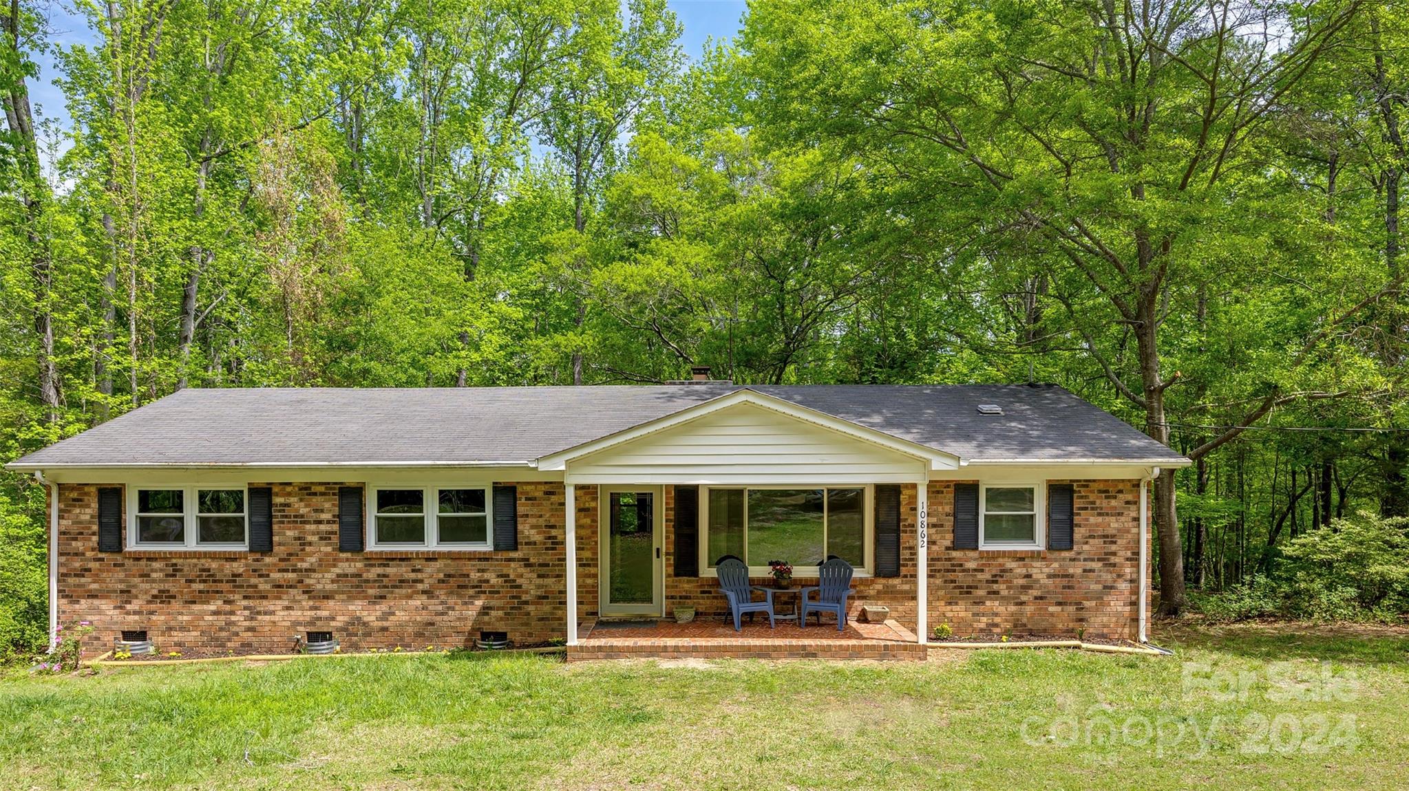 The call of birds and the quiet swaying of the trees welcome you home to this beautifully renovated ranch home. The home boasts plenty of upgrades including a bright kitchen with new quartz countertops and cabinets, completely new bathrooms, new LVP and carpet, new HVAC, and new windows that let in great natural light. This lovely property offers the perfect blend of tranquility, privacy and convenience, making it an ideal retreat for nature enthusiasts and those seeking a peaceful lifestyle. With just over 7.7 acres you have the space to create your own private paradise. Additionally, this could be a great investment for builders with an eye toward development of the other buildable lots within the acreage. Don’t miss the opportunity to live the lifestyle you have always wanted free of HOA and plenty of room to grow. This home offers a peaceful retreat while still being a short drive away from shopping and dining! *Historical property taxes reflect that this was a secondary home.