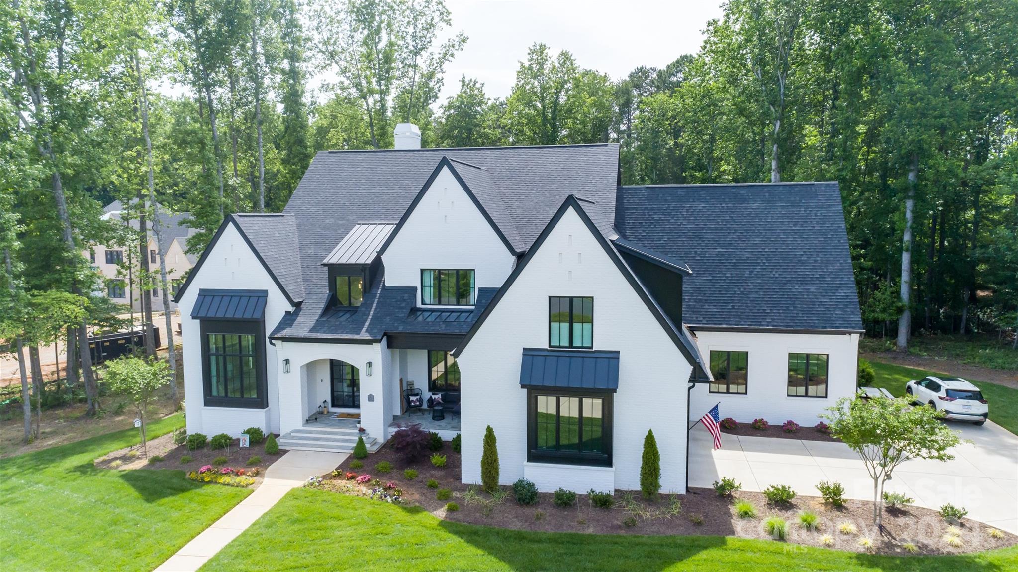 Fabulous nearly new build by AR Homes, less than one year old in prestigious Cheval, a unique equestrian community of fine homes & estate sized lots.  Riding & walking trails wind throughout the neighborhood. Boarding facility in the neighborhood features covered indoor & open outdoor riding arenas. Beautiful level lot is 1.63 acres. Stunning white brick modern farmhouse features a curved staircase off the foyer, main level primary suite, luxury primary bath w/ radiant heat floors, large guest suite also on the main level, as well as a huge island kitchen with hidden pantry/scullery (don't miss it!), drop zone area off garage, wet bar adjacent to great room, office, covered rear porch with built-in grill and outdoor gas fireplace central vac. Huge game/rec/entertainment room,theater room, workout room, hidden 2nd home office space up.  Whole house generator w/ 10 yr warranty,irrigation,uplighting on trees, gorgeous home. 5 BR & 5-1/2 Baths *PREQUAL OR PROOF OF FUNDS REQ'D TO VIEW*