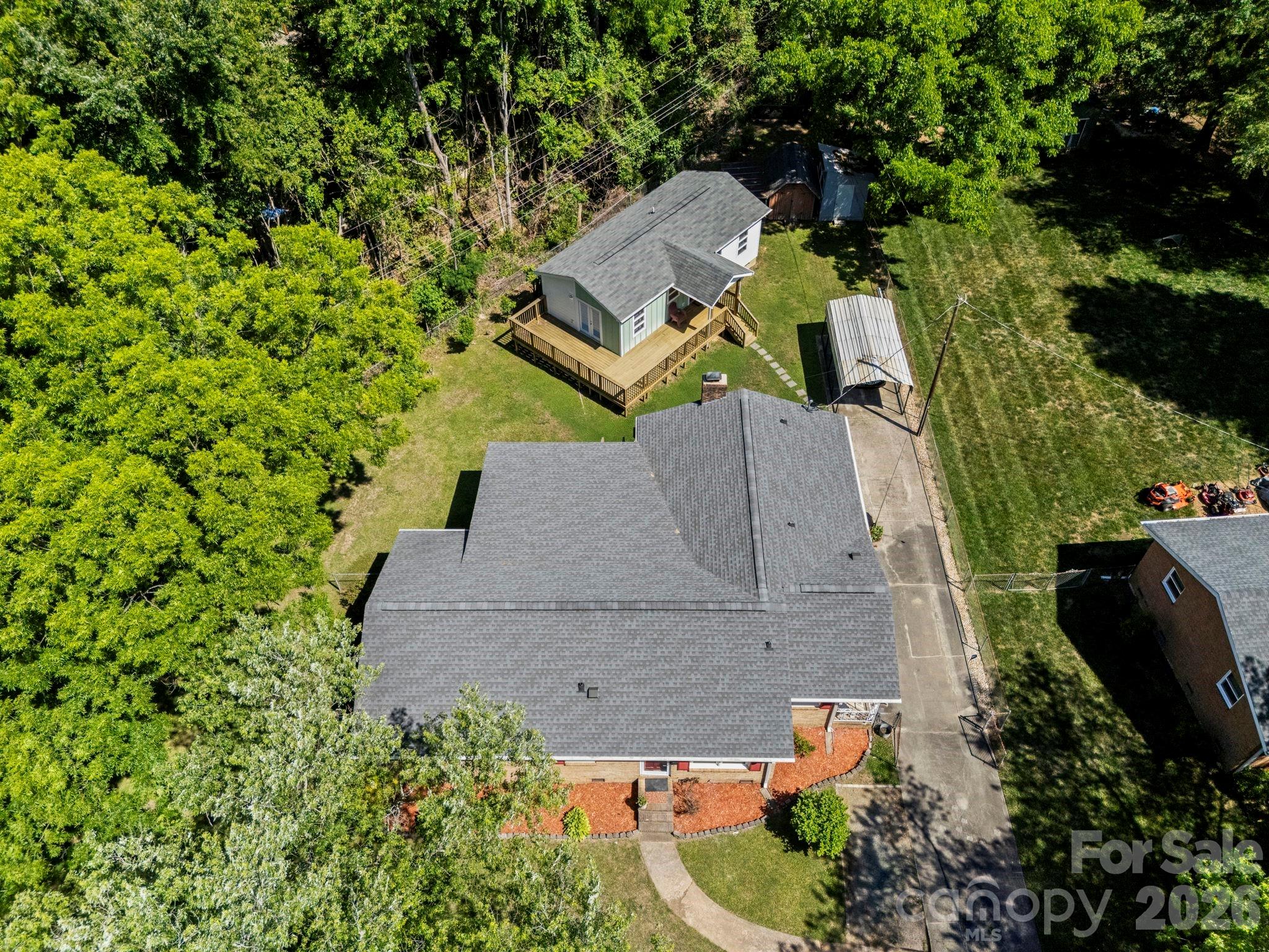 Welcome Home to 2 homes at one spectacular price! A primary home of 2145sf PLUS a 613sf secondary home positioned on a .47 acre lot in the charming Windsor Park neighborhood of E.Charlotte. Just 5 miles from Uptown and minutes from dining, nightlife, and the cultures of Plaza Midwood and NoDa. Primary includes 4-bed, 1.5-bath, featuring a wood burning fireplace, 5 year old roof, and new ductwork! PLUS an incredible income-producing opportunity home, built in 2021 complete with kitchen, 2 bedroom, full bath and half-wrap around deck! A fantastic multi-generational living arrangement, or an AirBnB to offset the mortgage. The large, level lot also has a long driveway with carport + a shorter driveway that can accommodate 2 cars. Includes 2 sheds for convenience and storage. The massive Eastland redevelopment that is underway nearby, and property values
steadily climbing - Windsor Park is one of Charlotte’s best-positioned neighborhoods for both lifestyle and long-term equity growth. Come see this property today.