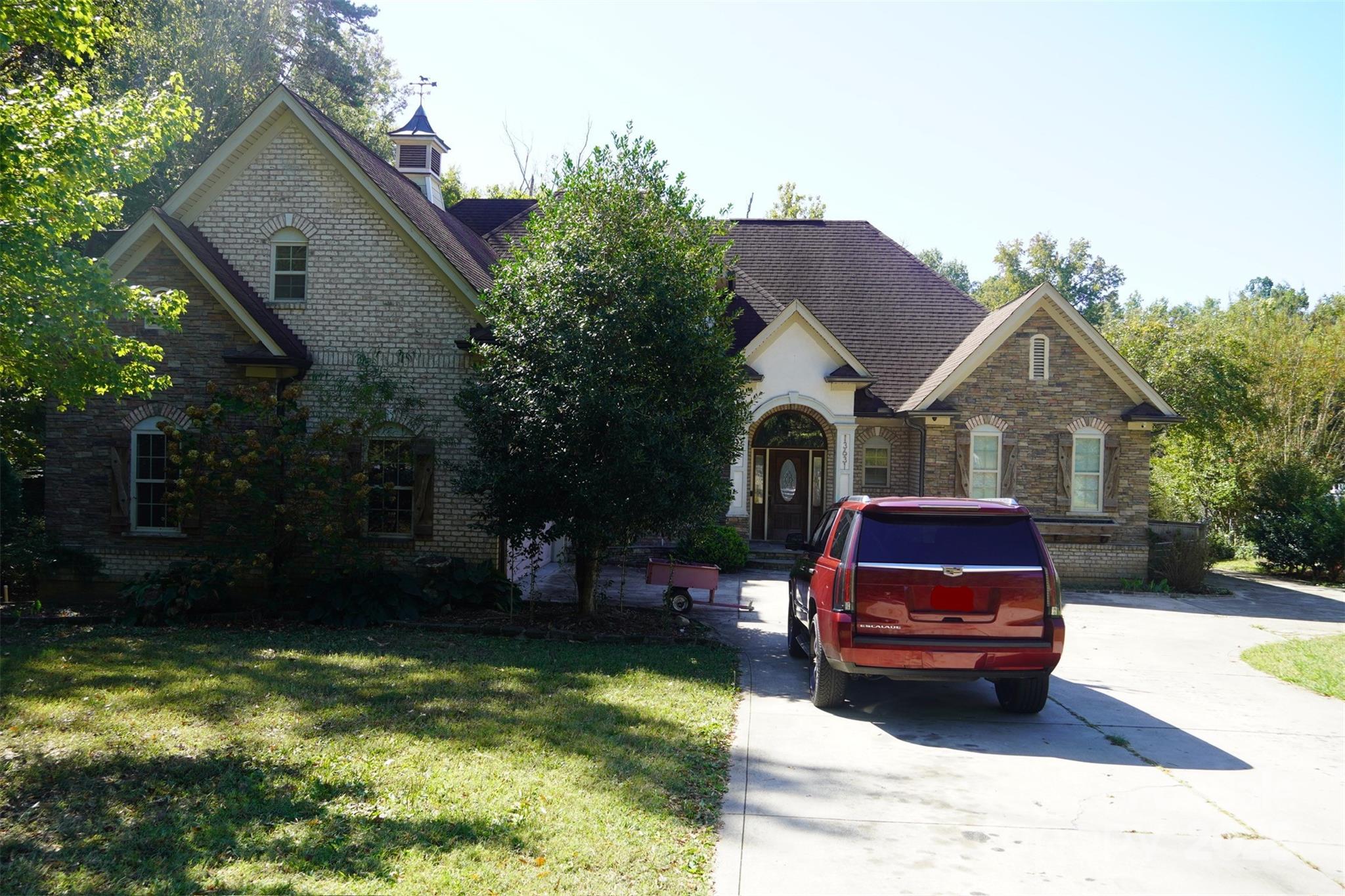 Welcome to this beautiful brick house with 5 bedrooms 4 and half bath and a bonus room-Ideal for a game room, home office, library, gym, etc. The back yard is big and private. It has two fig trees and two pear trees. It also has a gazebo and two sheds.
