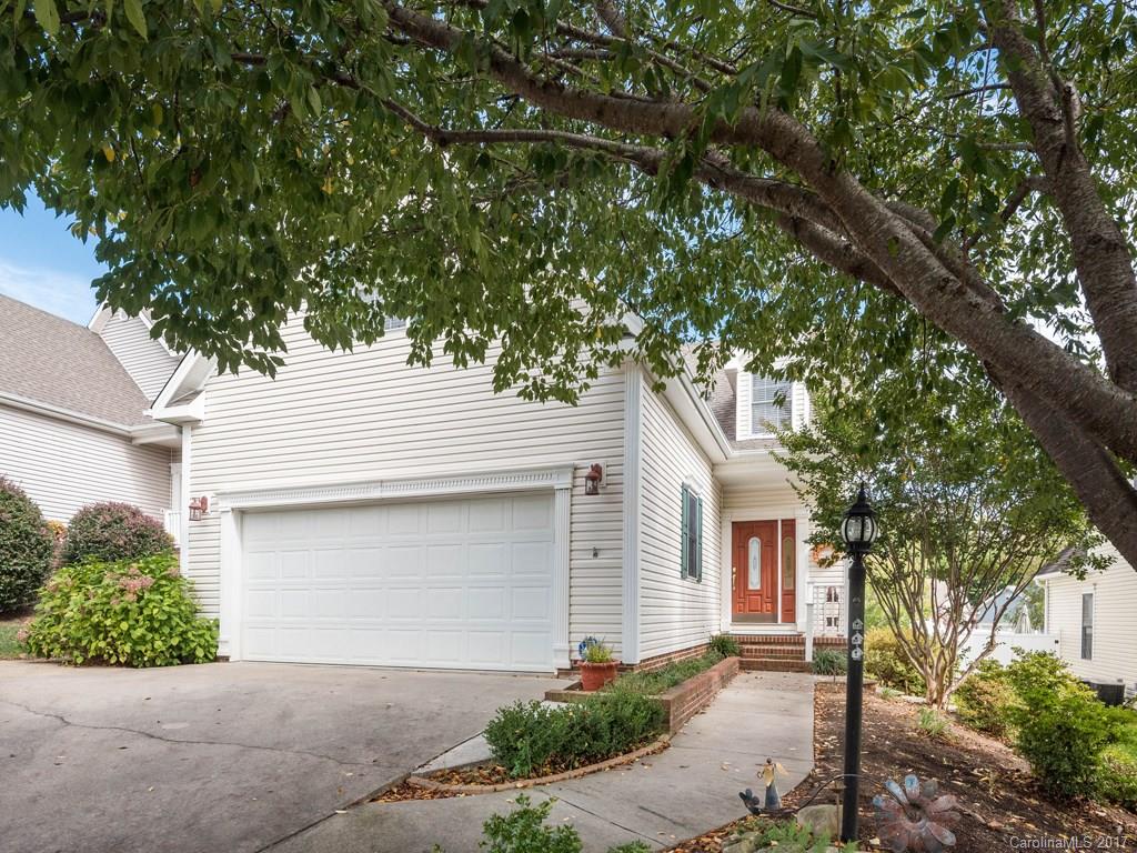 Beautiful move-in ready home in close-in East Asheville subdivision offering year-round mountain views from the sunroom and new back patio and the convenience of being just 10 min. to downtown. Master on main level with loft and bedrooms/living space upstairs. Updated kitchen with quartz countertop and stainless appliances. Enjoy a lock-and-go lifestyle with a home alarm system and low HOA fee including lawn maintenance. Less than 5 min. to the VA Hospital and Blue Ridge Parkway. No city taxes!