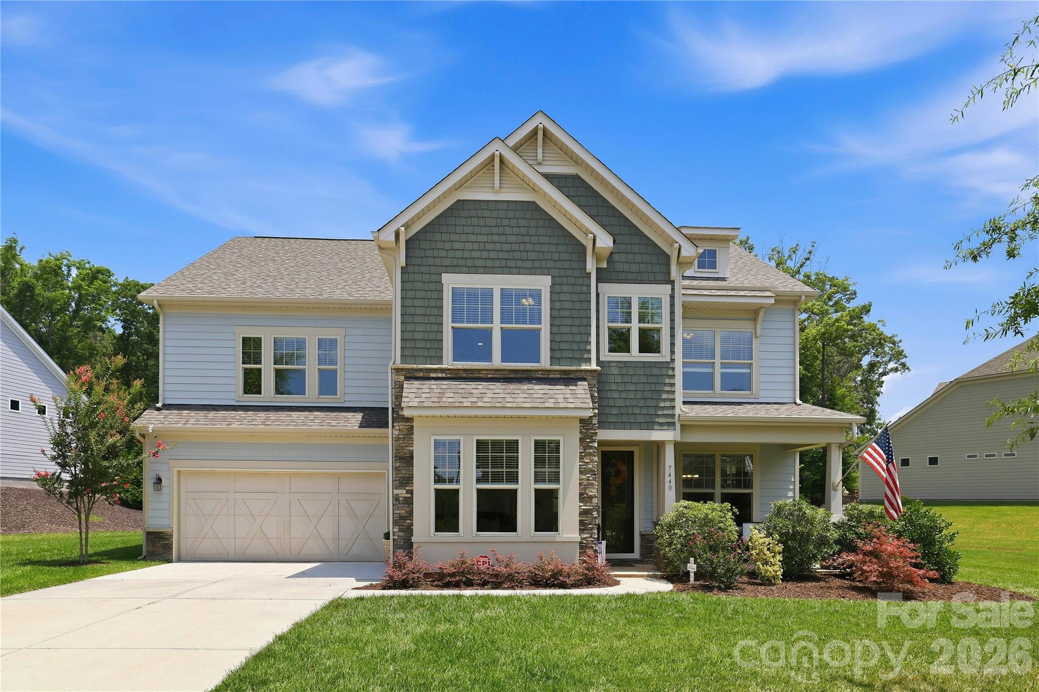 Welcome to the highly sought-after Bent Creek community, where this exceptional home is perfectly positioned on what is considered one of the largest and most desirable home sites in the neighborhood. This beautifully maintained & move-in ready home also offers the privacy of a wooded backyard while providing the convenience of community living. Located in Lancaster County, you'll enjoy the benefit of low property taxes. A charming rocking chair front porch creates a warm welcome, while inside you'll find hand-scraped hardwood floors throughout the main level, abundant natural light, and thoughtfully designed living spaces. The formal dining room is highlighted by classic wainscoting and transom windows that add both architectural charm and additional sunlight, plus a well-appointed buffet station featuring granite countertops, tile backsplash, and extensive cabinetry, making entertaining effortless. The study or family room across is ideal for “before dinner” quiet conversations. The spacious gourmet kitchen is truly the heart of the home. Designed with both the chef and entertainer in mind, it features granite countertops, a large center island w/bar seating, custom tile backsplash, double wall ovens, abundant cabinetry, and a Frigidaire S/S refrigerator that conveys. The oversized custom walk-in pantry provides exceptional storage and is perfectly suited for Costco-sized shopping. The adjoining breakfast area overlooks the private backyard. The great room offers built-in cabinetry, and a stunning floor-to-ceiling stone gas fireplace that creates an impressive focal point while providing the perfect gathering place for family and friends. Just before the three-car tandem garage, you'll appreciate the convenient drop zone designed to keep everyday life organized. Upstairs, an oversized loft provides flexible living space ideal for a media room, playroom, home office, or second family room. The luxurious primary suite serves as a peaceful retreat, offering two walk-in closets & an impressive spa-inspired bath complete with dual granite vanities, a relaxing garden tub, and a separate walk-in shower. Bedroom 4 enjoys its own private full bath. 2 additional generously sized bedrooms, another full bath, and an expansive 11' x 20' bonus room that offers endless possibilities for recreation, fitness, hobbies, or additional sleeping space. A spacious laundry room with folding area adds even more convenience. Outdoor living is equally impressive. The screened porch provides the perfect place to enjoy your morning coffee or unwind in the evenings while overlooking the beautifully wooded backyard. Step out onto the paver patio and grilling area, where entertaining family and friends becomes effortless in a setting that offers both privacy and tranquility. Residents of Bent Creek enjoy an outstanding amenity package including a clubhouse, outdoor swimming pool, fitness center, playground, walking trails, and sidewalks throughout the community. With its exceptional floor plan, abundant natural light, premium homesite, wooded backyard, three-car tandem garage, and outstanding community amenities, this home presents a rare opportunity to enjoy one of Bent Creek's finest properties. Priced Right For Quick Sale. Do Not Wait On This One!
