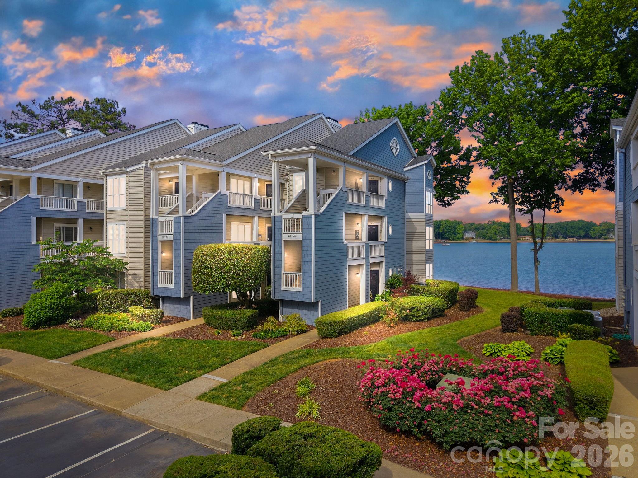 Beautifully updated ground-floor condo in highly desirable Davidson Landing with rare, unobstructed main channel views of Lake Norman! Unlike many lakefront condos currently on the market, this Southpoint unit offers peaceful open-water views rather than boat slip piers or highway exposure. Enjoy true one-level living with zero steps and a move-in ready interior designed for easy lake living.

Inside, you’ll find updated finishes throughout including luxury vinyl plank flooring, leathered quartz countertops, white shaker-style cabinetry, stainless steel appliances, updated lighting, new bathroom vanities, and a stylish frameless barn-door shower in the primary suite. Cozy up beside the electric fireplace or unwind on the covered porch featuring a built-in bar shelf and additional storage. Move-in ready complete with Washer, Dryer and Refrigerator.

Located just minutes from charming downtown Davidson, Davidson College, grocery stores, dining, shopping, Davidson Day School, and Community School of Davidson, this location offers exceptional convenience with an easy commute to Charlotte and Charlotte Douglas Airport.

Southpoint amenities include a pool, fitness/walking trails, sport courts, kayak and paddleboard launch/storage area, pier, day dock, and picnic areas. Boat slips may be available separately by lease agreement and subject to availability.

Thinking about an investment property?  This condo income as a rental was recently $24,000 annually.

Perfect as a primary residence, weekend retreat, or ideal setup for Davidson College parents or students wanting to stay close to campus and all the area has to offer. Lake lovers, cyclists, and those seeking low-maintenance living will appreciate the incredible lifestyle this condo delivers.