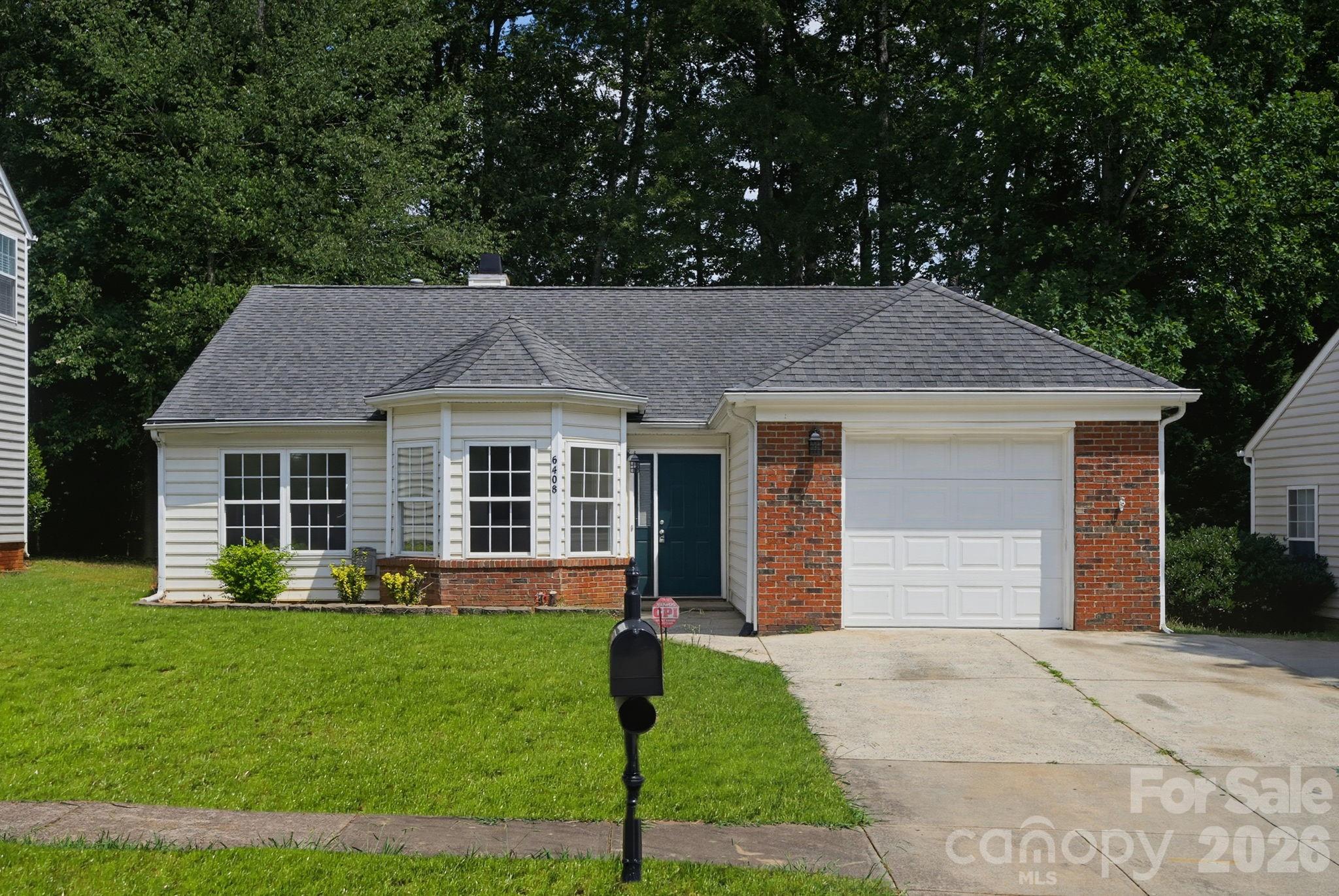 Located in the highly desirable UNC Charlotte area, this beautifully updated ranch home is minutes from  I85, I77, and I485 with quick access to shopping, dining, the airport, and other venues throughout Charlotte metro. A large, open, vaulted family room creates a warm welcome with almost everything updated. New luxury vinyl plank flooring and fresh paint throughout the interior. New kitchen countertops, new appliances (refrigerator, stove/oven, microwave, dishwasher, garbage disposal), freshly painted kitchen cabinets. Fabulous new garage floor covering and fresh wall paint. Roofing is in good shape, estimated to have been replaced in the early 2020s. HVAC units outside and in the attic dated 2022 and recently inspected. Fireplace components have been replaced. A functional concrete patio and freshly-painted deck at the back of the home offer a great space to relax outside or entertain. The yard and landscaping have also been improved, with grass having been recently sown. May need overseeding again in the fall. This home has been extensively upgraded such that it looks and functions close to a new home.