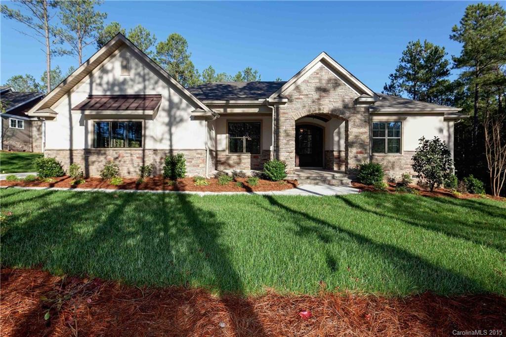 The Charles plan has everything you've been dreaming of. With this spacious ranch style home, you will be delighted with the spacious layout. Perfect for entertaining, or just enjoying your serene view of nature. The expansive covered back porch offers over 500 sqft of prime entertaining area featuring stainless stell grill and kitchen area, plus a fireplace. *Home pictured may be different. Stock Photos