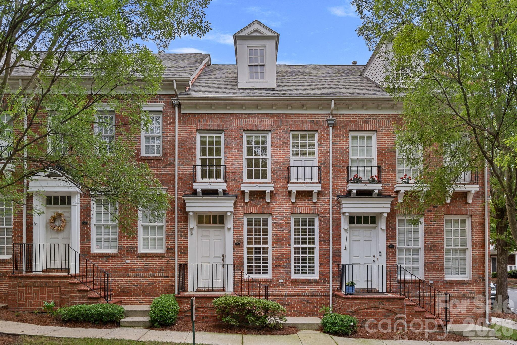 Welcome to effortless Davidson living in one of the area's most walkable communities. Beautifully refreshed with today's most desirable finishes, this move-in ready 2BR/2.5 Bath townhome combines timeless style with low-maintenance living just minutes from everything that makes Davidson so special.
The bright white kitchen has been thoughtfully updated with quartz countertops, a classic subway tile backsplash, brand-new stainless steel appliances, and abundant cabinetry. Luxury vinyl plank flooring extends throughout the main level, while fresh interior paint and new carpet upstairs create a crisp, inviting feel from the moment you enter. The open-concept floor plan seamlessly connects the kitchen, dining area, and spacious living room with a cozy gas fireplace, perfect for entertaining or everyday living.
Upstairs, both generously sized bedrooms feature private ensuite bathrooms and walk-in closets, providing exceptional comfort and privacy for owners, guests, or roommates. The spacious primary suite includes a double vanity, while the conveniently located second-floor laundry makes daily living even easier.
Step outside to enjoy your own private fenced courtyard, an ideal space for morning coffee, container gardening, or relaxing evenings outdoors. The home also includes a deeded parking space and offers a truly low-maintenance lifestyle. Located just a short stroll from grocery stores, restaurants, local shops, parks, greenways, and highly sought-after schools, this home offers the walkable Davidson lifestyle buyers love without the maintenance of a single-family home. Stylishly updated, thoughtfully designed, and truly move-in ready, this is an exceptional opportunity to enjoy all that Davidson has to offer.