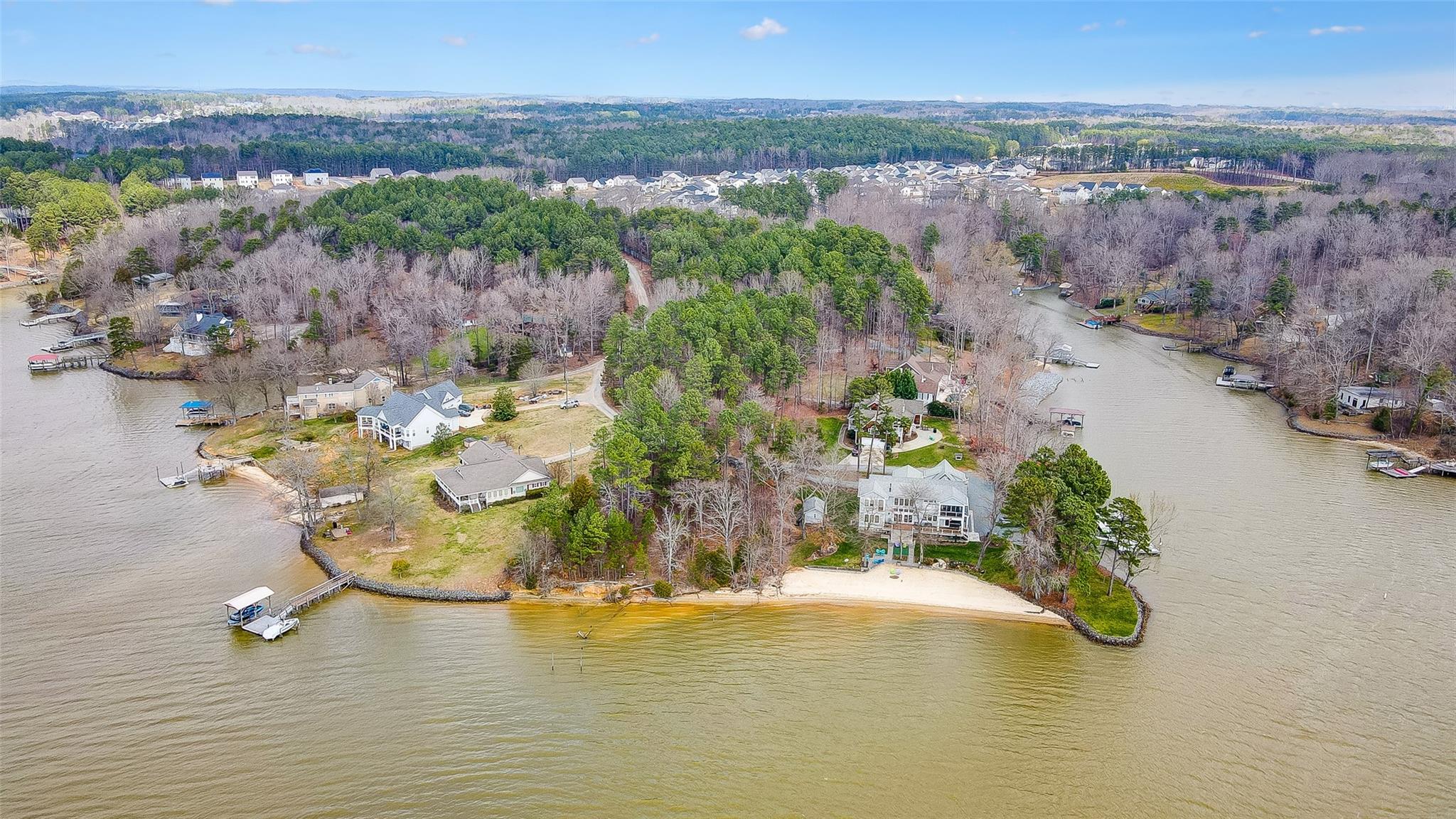 Enjoy stunning, main channel sunset views from this Waterfront homesite on Lake Wylie! Truly a rare find and a “one of a kind” property on a 0.62 acre lot with beautiful hardwood trees, perfect for shade and privacy, gentle topography for easy access to the lake, and glorious lake views. Fantastic opportunity to own a piece of paradise and build your waterfront home exactly the way you dreamed and enjoy lakefront living! Great location next to The Palisades, where golf and tennis memberships are available, minutes from shopping, dining, uptown Charlotte & airport.
