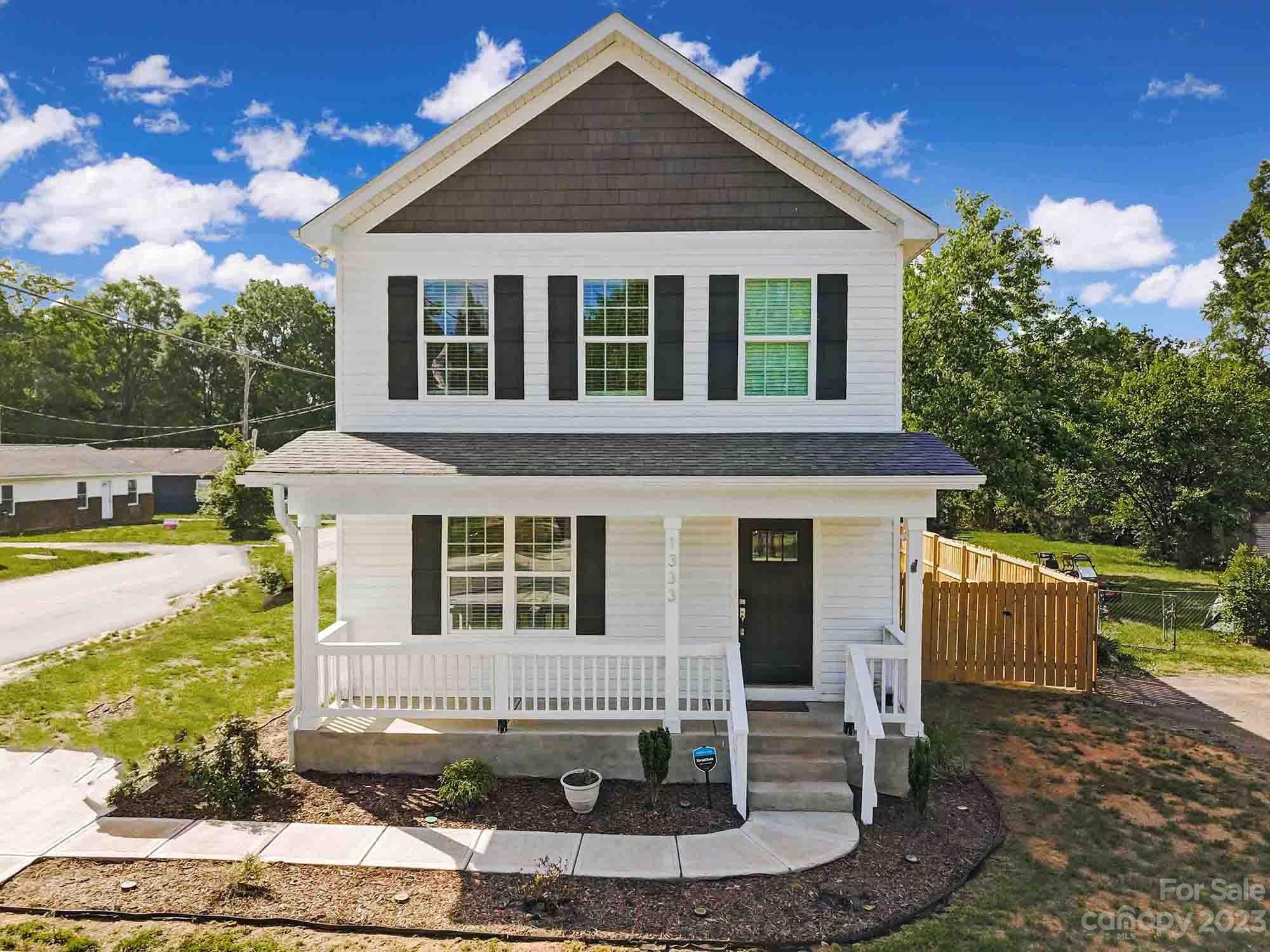 ALMOST new construction in the heart of Rock Hill - less than one year old! Beautiful 3 bed/2.5 bath home close to downtown, shopping, dining, and everything else this great city has to offer! Downstairs features open floorplan living/dining/kitchen with white shaker cabinets, granite counters, and stainless appliances. Upstairs boasts primary bedroom with ensuite bath, plus two secondary bedrooms and additional full bathroom. Spacious corner lot with newly-fenced backyard! Don't miss this opportunity!