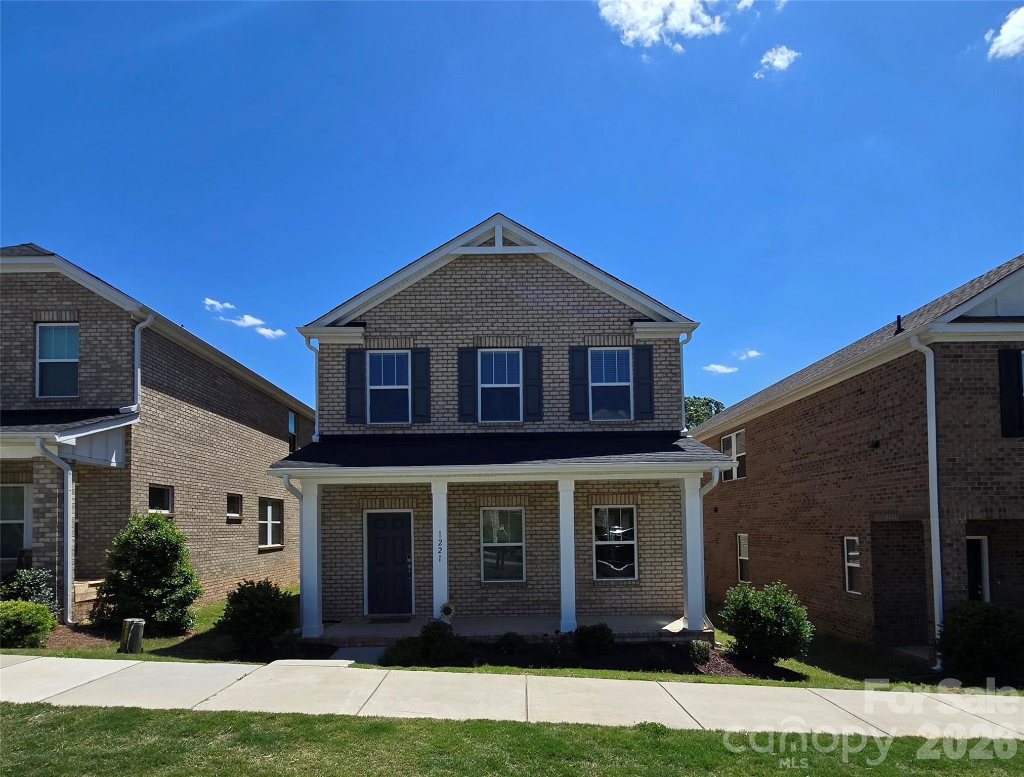 Beautiful all-brick home built in 2021 located in highly desirable Mint Hill Village just minutes from shopping, dining, parks, and I-485. This move-in-ready 4-bedroom, 2.5-bath home features an open-concept floor plan filled with natural light, spacious living areas, and a stylish kitchen complete with an oversized island, large pantry, and ample cabinet space. Upstairs offers generously sized bedrooms plus a versatile loft ideal for a home office, media room, or flex space. Enjoy the convenience of a rear-entry 2-car garage, low-maintenance living, and nearby community amenities including green space and a dog park. Conveniently located near downtown Mint Hill, Matthews, and Uptown Charlotte, this home offers the perfect combination of comfort, convenience, and newer construction living.