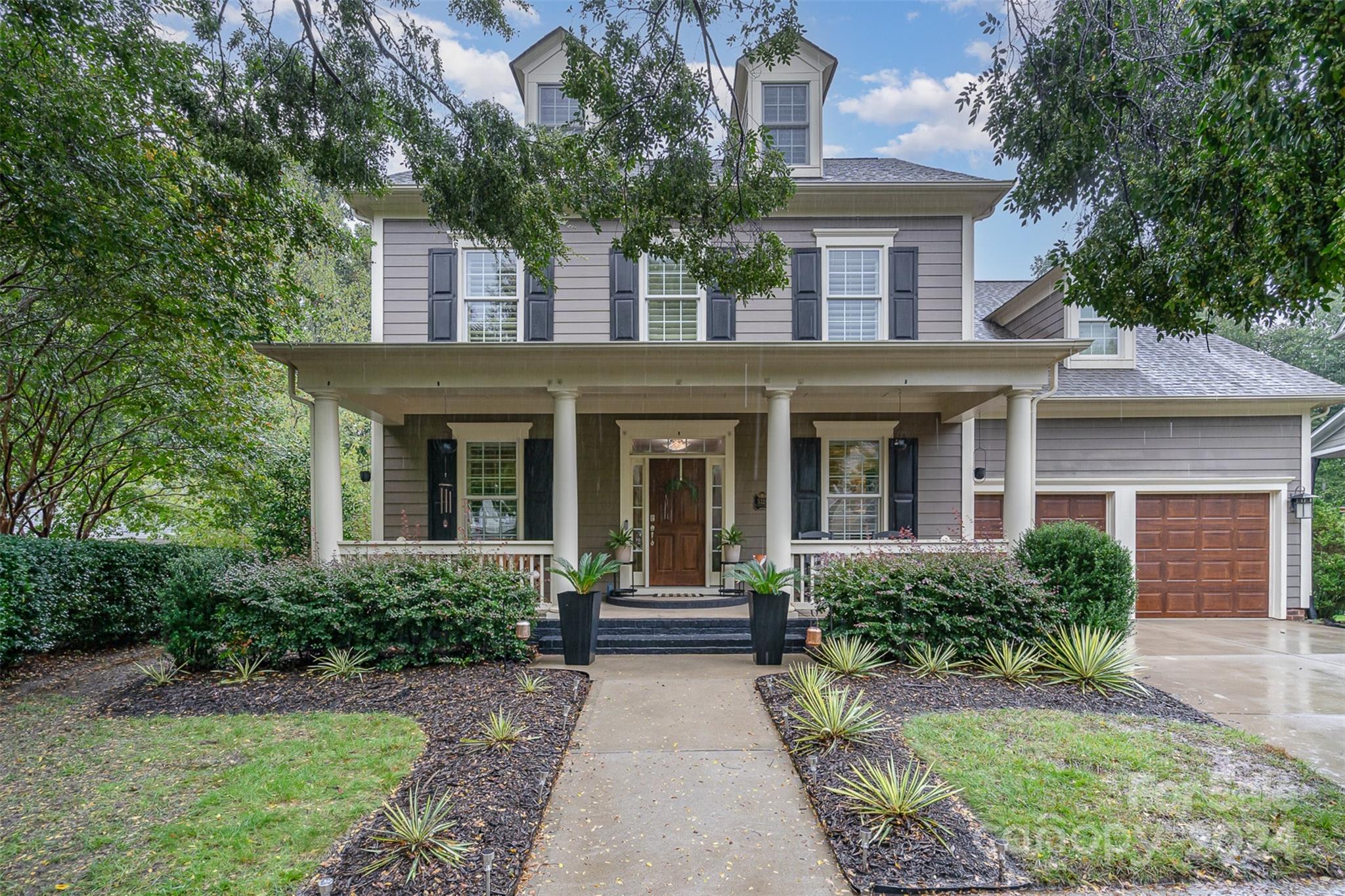 Welcome to the beautiful Baxter cul-de-sac home with a rocking chair front porch! Step inside to the light and airy home with neutral paint, plantation shutters, window filled living spaces and hardwoods throughout main floor. This amazing floor plan has a dedicated office, laundry room, primary bedroom and spare bedroom all on the on the MAIN FLOOR! The primary bedroom has a custom walk-in closet & attached bathroom with dual vanity granite countertops. Enjoy the great room with vaulted ceilings, built-ins and plenty of natural light. Off of the dining area you'll be amazed by the tranquil & private stone built porch with built-in fire place that overlooks the tree-line back yard. The client is close to retirement, wants to downsize, and be further out from Fort Mill.