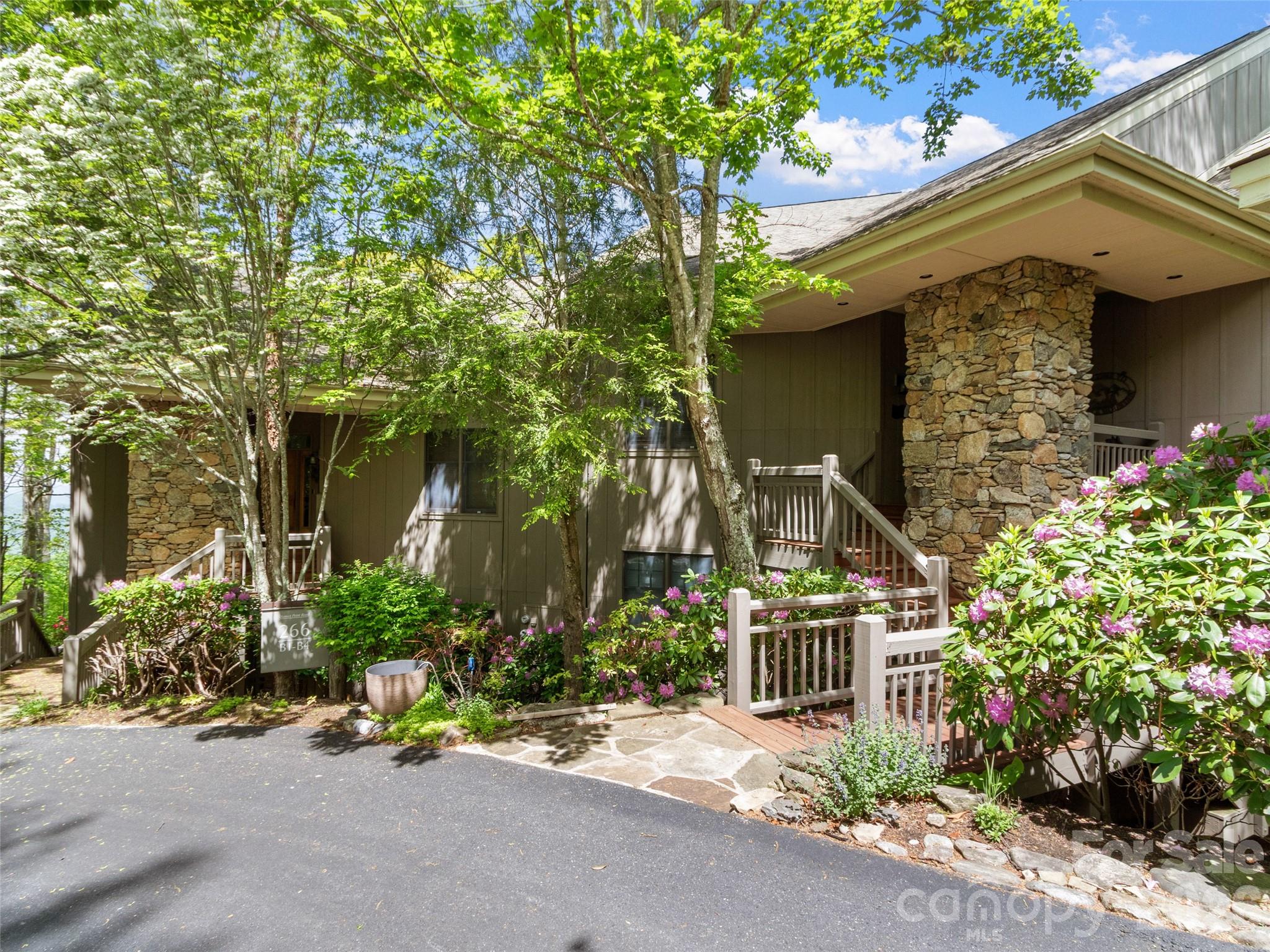 This neighborhood is the most private on the mountain. With spectacular sunset views, long range mountain views and cool weather all summer long. There are only 8 units in this neighborhood, so everyone knows each other and it is quiet all of the time. Golf carts have their own garages and there are plenty of car parking spaces. This unit has been updated including making the screened porch an all year room now. The tankless water heater is new and all of the furnishings stay with the home. This is a favorite floor plan on the mountain and Sunset Point is a very unique and favorite neighborhood. Mountain Air is a gated community, just 35 minutes from Asheville. All owners have access to 6 parks and 7 miles of hiking trails. Mountain Air Country Club is a private club at the top of the mountain with its own airstrip, golf, tennis, pickle ball courts, nature center, kids' day camp, golf shop, golf learning center and 3 dining choices, including the mountain market. The average daily temperature is 75° in the summer.