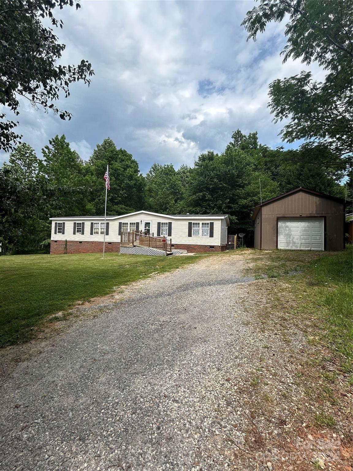 This lovely  4 bedroom home is in a country setting but convenient to shopping in York, Clover or Lake Wylie.  Quiet neighborhood with no through traffic. 16 x 28 detached garage/workshop with upper level storage. Additionally there is a 20x12 storage building and a 10x12 storage building. Private fenced back yard. Low county taxes! New AC on 5/2024.