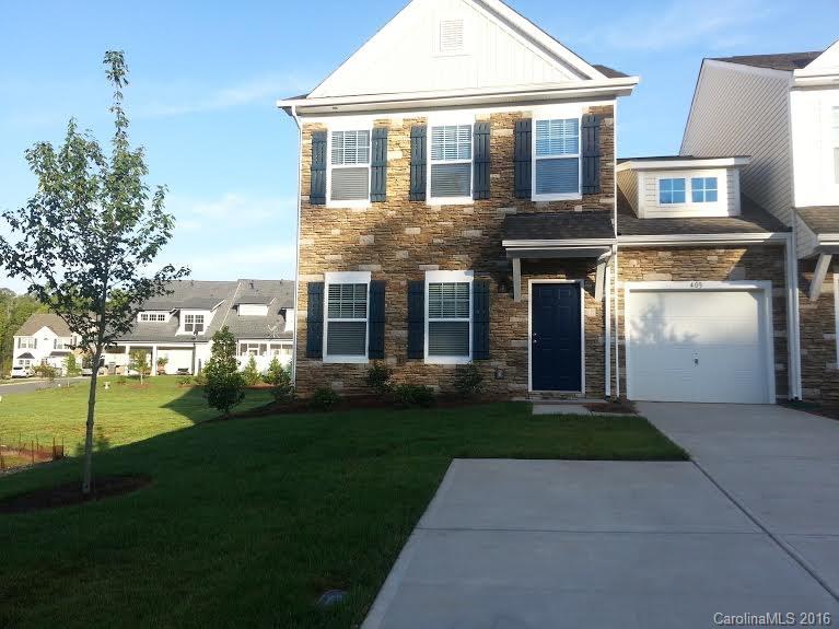 Beautiful upgraded End Unit town home with Sought after Master Down layout, Shows like a model, open floor plan and tons of style! This 3 bedroom 2.5 bath floor plan includes a bonus/storage room upstairs. Finish includes  & Hardwoods, Ceramic Tile Flooring, Stainless Steel Appliances, Granite in Kit & Baths, Custom Trim & Paint, Upgraded lighting & more! Gated Community convenient located near Lake Wylie & minutes to Charlotte, Gastonia, Rock Hill.
