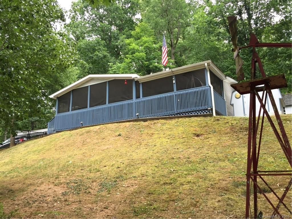 Very nice, very clean, very green and peaceful. This home is the best kept double-wide I have seen. It is move-in ready. Large yard and many mature hardwoods on the acreage. Only 20 minutes to town but you are in the quiet country.