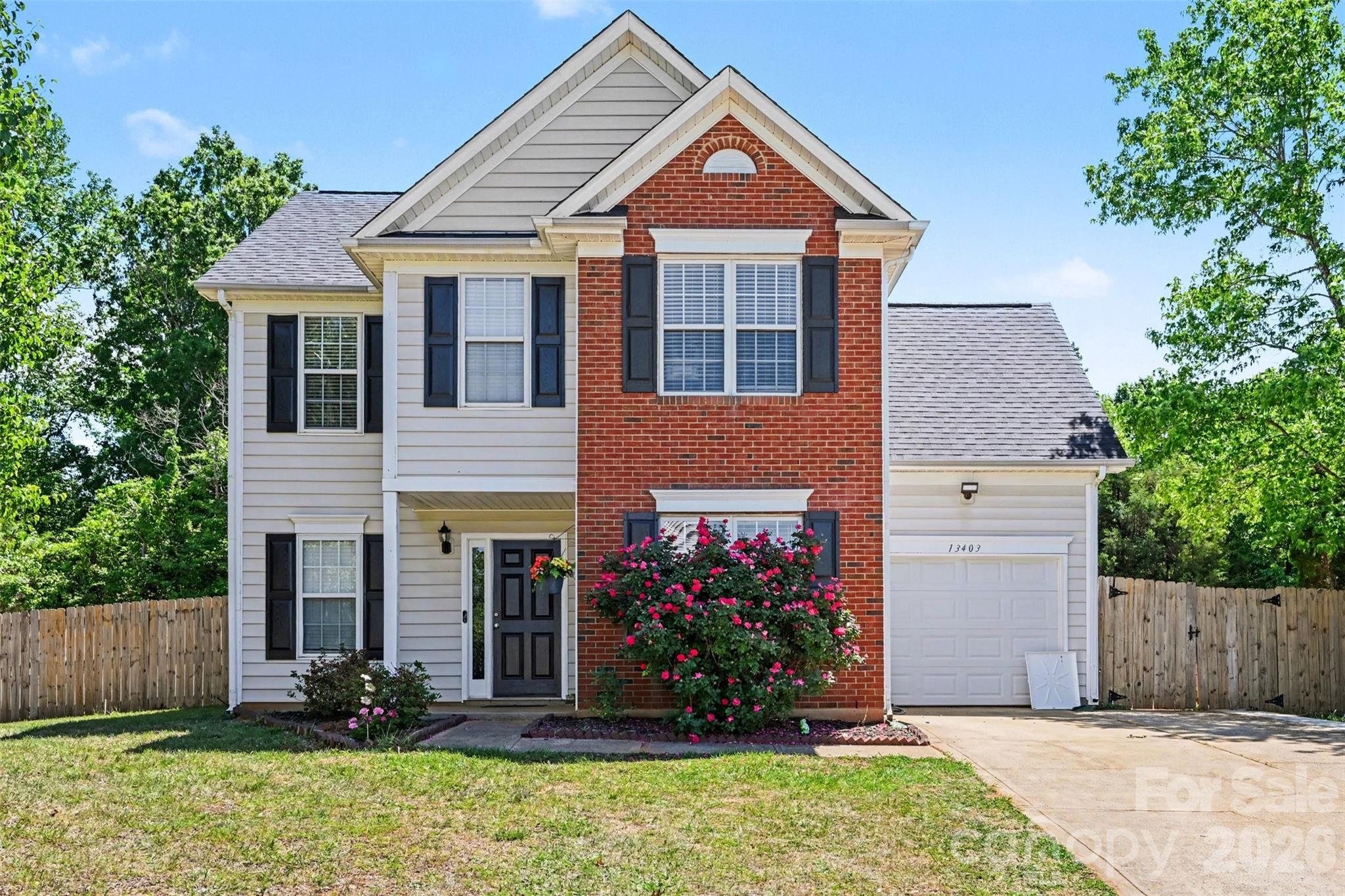 Welcome to 13403 Willow Falls Road in Charlotte, NC. This 3-bedroom, 2.5-bath home offers a fresh and updated feel throughout.

Enjoy a bonus room featuring a beautiful herringbone hardwood floor design, along with new hardwood flooring on the upper level. The bathrooms have been updated with modern tile floors and new mirrors, while new light fixtures throughout the home add a bright, clean touch.

Situated on a corner lot, this property also features a fenced backyard, perfect for outdoor use, and an extended driveway with plenty of parking space, and an aluminum shed for additional storage.