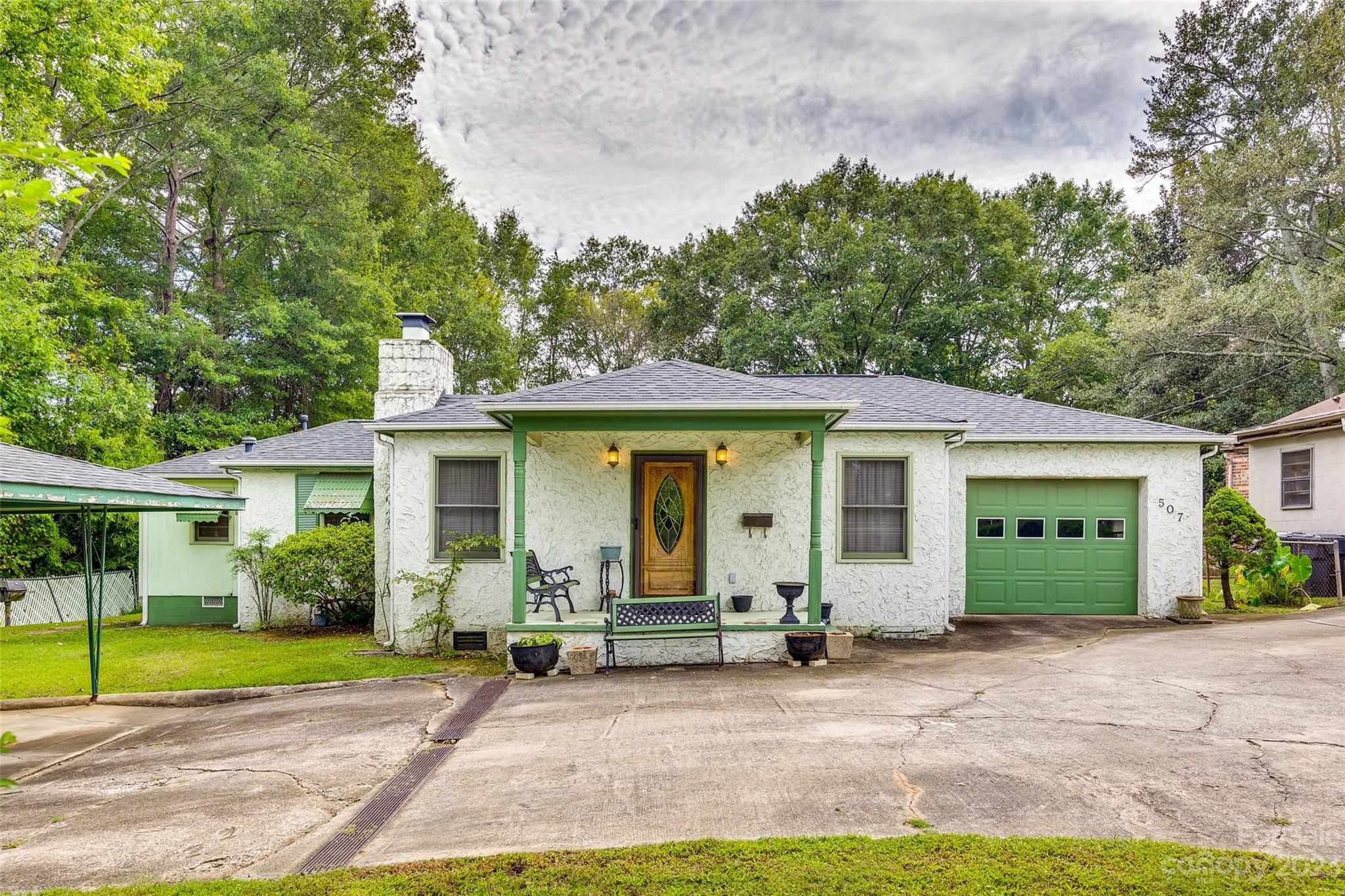 Welcome to this charming home located at 507 E Main St, Dallas, NC 28034! Nestled on a generous 17,860 sq ft lot, this delightful home offers a cozy and inviting atmosphere. With 2 bedrooms and 1.5 bathrooms spread across 1,453 sq ft of living space, this is perfect for those seeking a comfortable and manageable space. Built in 1960, the the home offers a touch of vintage allure. As you explore the surrounding area, you'll be pleased to discover the property's close proximity to the vibrant downtown area, where the heartbeat of the city can be felt. A plethora of nearby amenities, including parks, shops, and restaurants, cater to your every need. What sets this property apart from its neighbors is its unique character and undeniable charm. Don't miss out on the opportunity to call this place home!