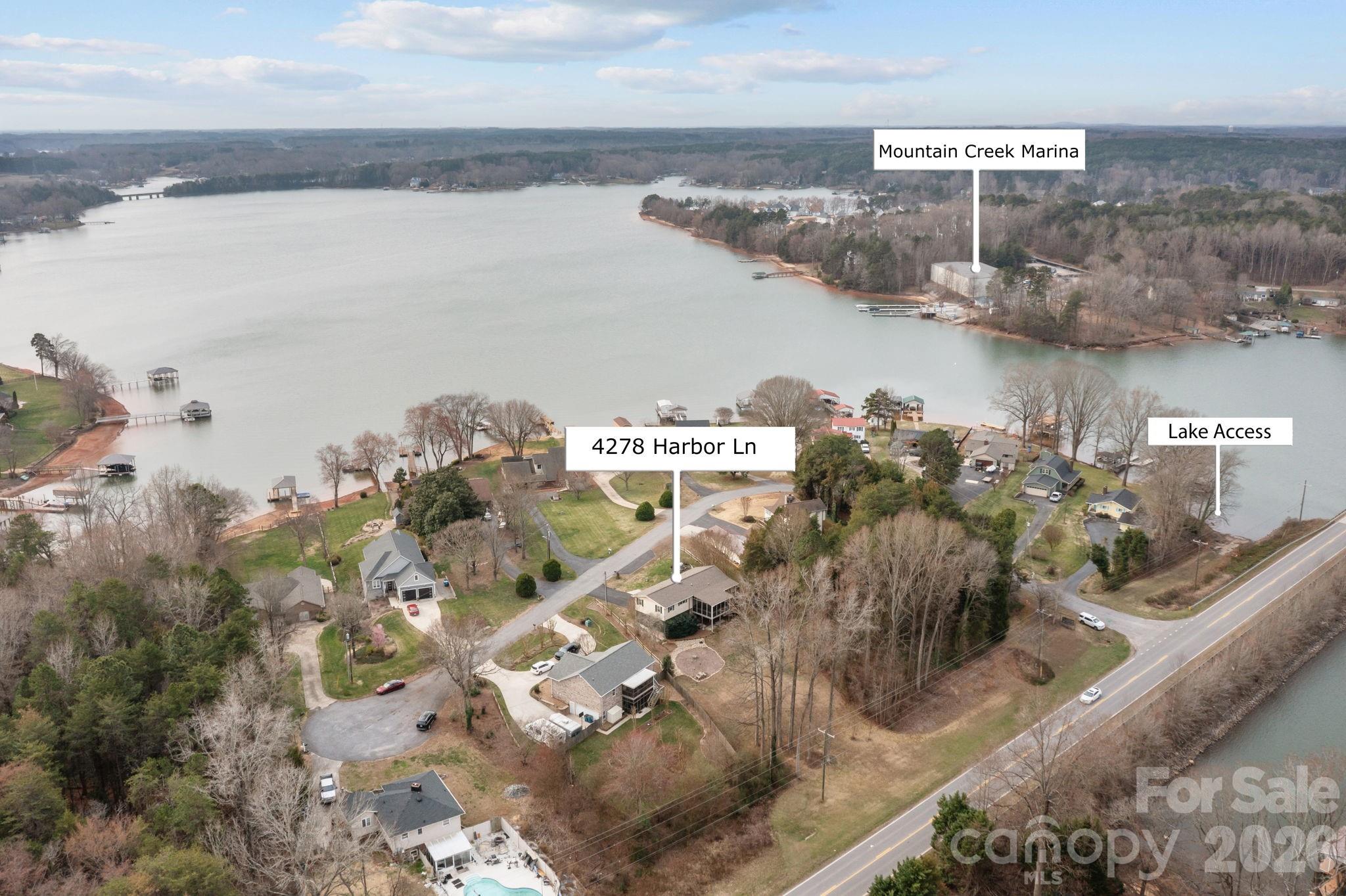 This Rare Opportunity with Lake Views and Lake Access to Lake Norman is back on the market after further inspection.  The property has been evaluated by a structural engineer. According to the engineer, the observed settling is longstanding, related to original construction methods, and not believed to be ongoing. Additional evaluation of the decking by a licensed deck contractor has been recommended and is currently in process. Reports and findings from the engineer are attached to this listing.
This is a unique opportunity to own an affordable property with beautiful lake views of Lake Norman. This 3 bed, 2 bath home is perfect as a full-time residence, seasonal getaway, or even a VRBO/investment rental property.
Built elevated to maximize the stunning water views, the home offers year-round lake views from the front. During the winter months, additional lake views can be enjoyed from the rear of the home on either of the screened in decks, while mature trees provide natural privacy throughout the summer.
This one-owner home has been exceptionally well cared for and features several recent updates, including fresh interior paint, new carpeting in the bedrooms, hallway, and living area, as well as, updated electrical outlets and some lighting.  A whole house water filtration system was also put into place in 2003 and is maintained every 6 months.  The windows have also been replaced in the sellers ownership.  The one-level open floor plan offers comfortable living with a spacious laundry room, three bedrooms, and two full baths.
Step directly from the kitchen onto a two-level screened-in back porch—ideal for entertaining or relaxing while enjoying the peaceful surroundings.
Beautiful water views can be appreciated from every room on the front of the home creating a bright and inviting atmosphere throughout.
An added bonus is deeded water access. All 17 homeowners share ownership of the first lot on the right as you enter the neighborhood, which provides access to Lake Norman. Bring your boat right from the driveway to the lake access point!!!  Mountain Creek Marina is also conveniently located less than a quarter mile drive from the property or just across the water from the lake access. (Mountain Creek Marina - 704-483-0077/mtcreekmarina.com)
Major updates include:
Universal Windows (2019-30 year warranty)
New roof (2020)
Heat pump/Central air system (2021)
Whole house water filtration system (2003)
updated decking and screened in back decks 
carpet, electrical outlets and some lighting (2025/2026)
washer/dryer conveys.
Schedule your showing today and start enjoying lake living at an affordable price!
For information regarding the 150 widening project visit:  
https://www.ncdot.gov/projects/nc-150/Pages/default.aspx