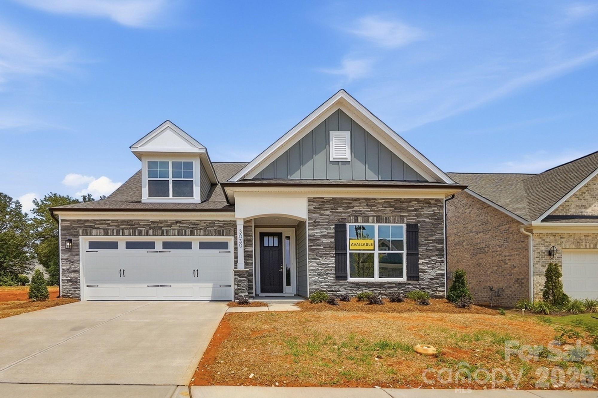 Welcome to a new age-restricted community in Gastonia close to shopping, dining and other conveniences! This wonderful Wescott plan offers 3 bedrooms, 3 full baths, and more than 2,700 square feet of living space. The spacious main level has more than 2,000 sf and has an office with French doors, a dining room with tray ceiling, family room with gas fireplace, mud room with drop zone, laundry room with cabinets, a secondary bedroom, full bath with a 4-ft shower, plus the primary suite. The primary suite is a true retreat with a bedroom with tray ceiling, a luxury shower, and a sitting room. The upper floor provides another living area complete with a loft, bedroom with walk-in closet, and full bath with a tub/shower combo. The designer kitchen has white cabinets with a contrasting dark grey island, quartz counters, tile backsplash, a stainless range hood, and stainless appliances, including a gas cooktop. Other beautiful design features include composite stair treads and metal balusters, Enhanced Vinyl Plank flooring, upgraded wood trim, and a paver patio. Visit today!