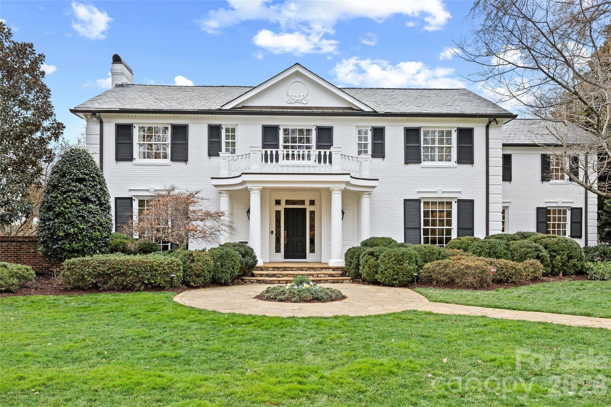LUXURY LIVING IN EASTOVER!  Experience unmatched elegance in this spectacular Eastover residence, where timeless design meets modern sophistication.  Bathed in natural light, the home features a highly sought-after floor plan crafted for effortless entertaining and comfortable everyday living.  Exceptional craftsmanship and high-end finishes are showcased throughout.  The show-stopping chef’s kitchen flows seamlessly into a fireside family room and lounge creating the true heart of the home.  Generous formal and informal living spaces offer the perfect backdrop for gatherings of any size.  The serene primary suite serves as a private retreat with a beautifully appointed bathroom and walk-in closets.  The main house includes five bedrooms and four full bathrooms, plus a versatile bonus room and dedicated office to accommodate a variety of needs.  The beautifully designed pool house enhances the property with its own living space, full kitchen, bedroom, bathroom, and dedicated workout room perfect for guests, extended stays, or a private escape.  Outdoor living is equally impressive.  A covered porch overlooks the private, fenced backyard with a stunning pool ideal for year-round relaxation and entertaining.  A charming grilling and dining area completes the setting.  Convenient to shops and restaurants in Eastover, Myers Park, and easy commute to Uptown!  Main House:  6,210 HLA, Guest House:  1,606 HLA, Total:  7,816 HLA.
