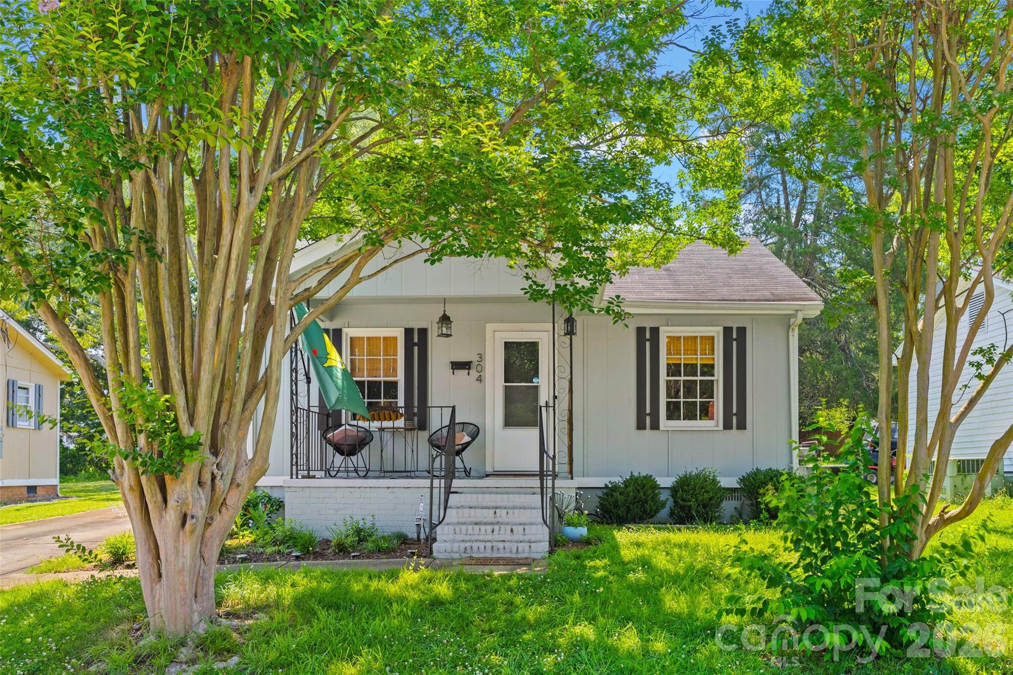 Welcome to this charming bungalow nestled in the heart of Rock Hill! Situated in a quiet, established neighborhood, this inviting 2-bedroom, 1-bath home offers the perfect blend of comfort and convenience—ideal for first-time homebuyers, downsizers, or anyone seeking low-maintenance living. Inside, you'll find a warm and welcoming layout with a spacious kitchen featuring abundant cabinetry, generous counter space, and plenty of room for meal preparation and storage. Step outside to enjoy the large backyard, offering endless possibilities for gardening, entertaining, or simply relaxing. Conveniently located just minutes from schools, parks, shopping, dining, and all the amenities of Riverwalk, this home is a wonderful opportunity to enjoy everything Rock Hill has to offer.