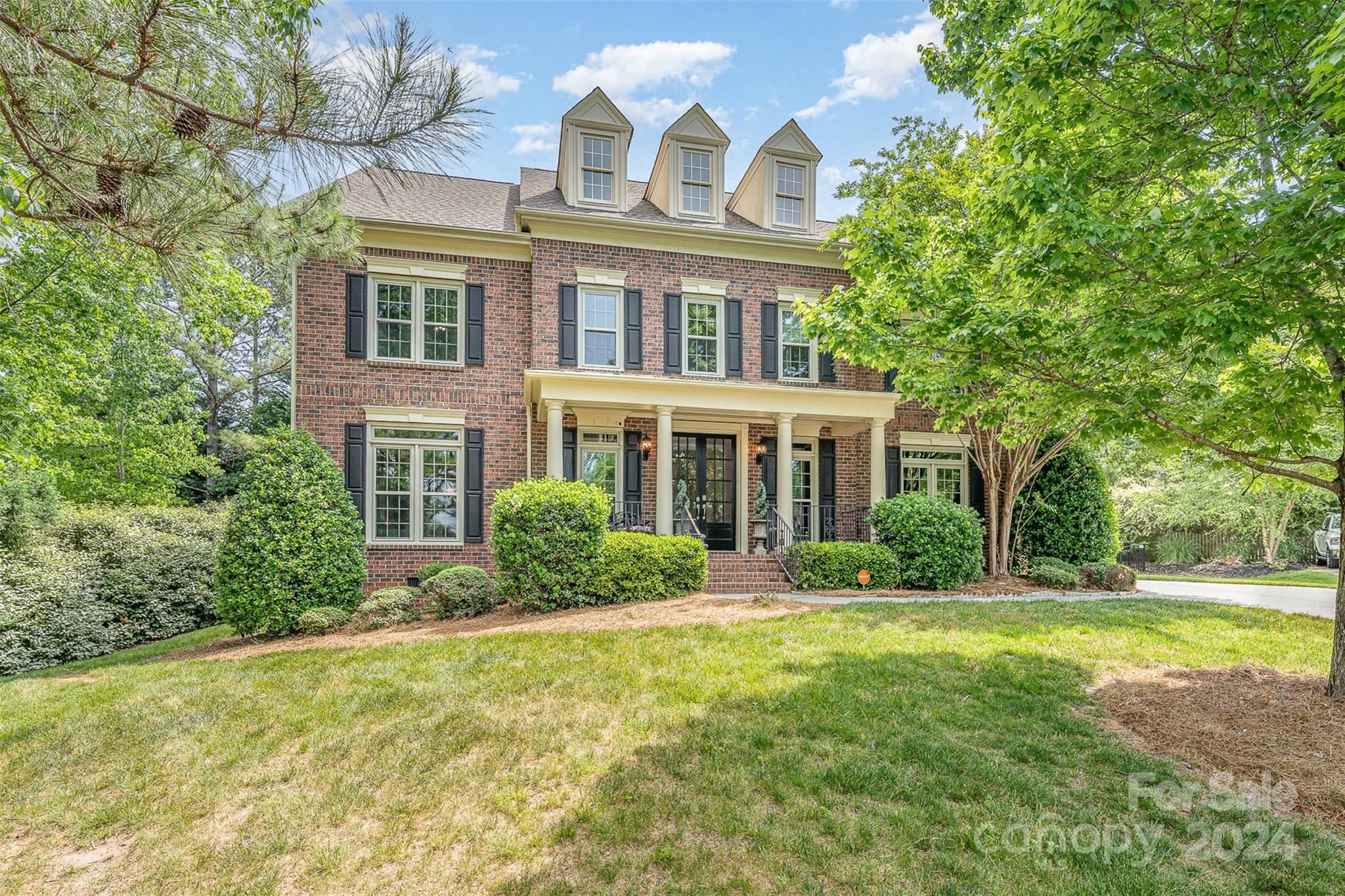 SELLERS OFFERING $5000 CREDIT to buyer to use at closing (buy down interest rate, save on closing/moving costs, new upgrades - U PICK!). This classic John Wieland Windsor greets you w/ a grand staircase & a freshly painted open floor plan, complimented by hardwood floors on the main level & adorned w/ beautiful molding throughout. An abundance of natural light floods the two-story living room w/ new windows installed through most of home. Upstairs, retreat to the primary bedroom featuring engineered hardwood floors + two walk-in closets & a versatile flex space w/ book casing. Sharing the second floor is one full ensuite & two bedrooms w/ a Jack & Jill bathroom. The third floor has a generously sized bed/bonus room w/ new carpet & ample unfinished walk-in attic space, offering endless possibilities. Relax in your screened-in side porch on this quiet culdesac lot or enjoy your fenced in back yard where your new hot tub awaits. All nestled in the amenity-rich neighborhood of BridgeMill.