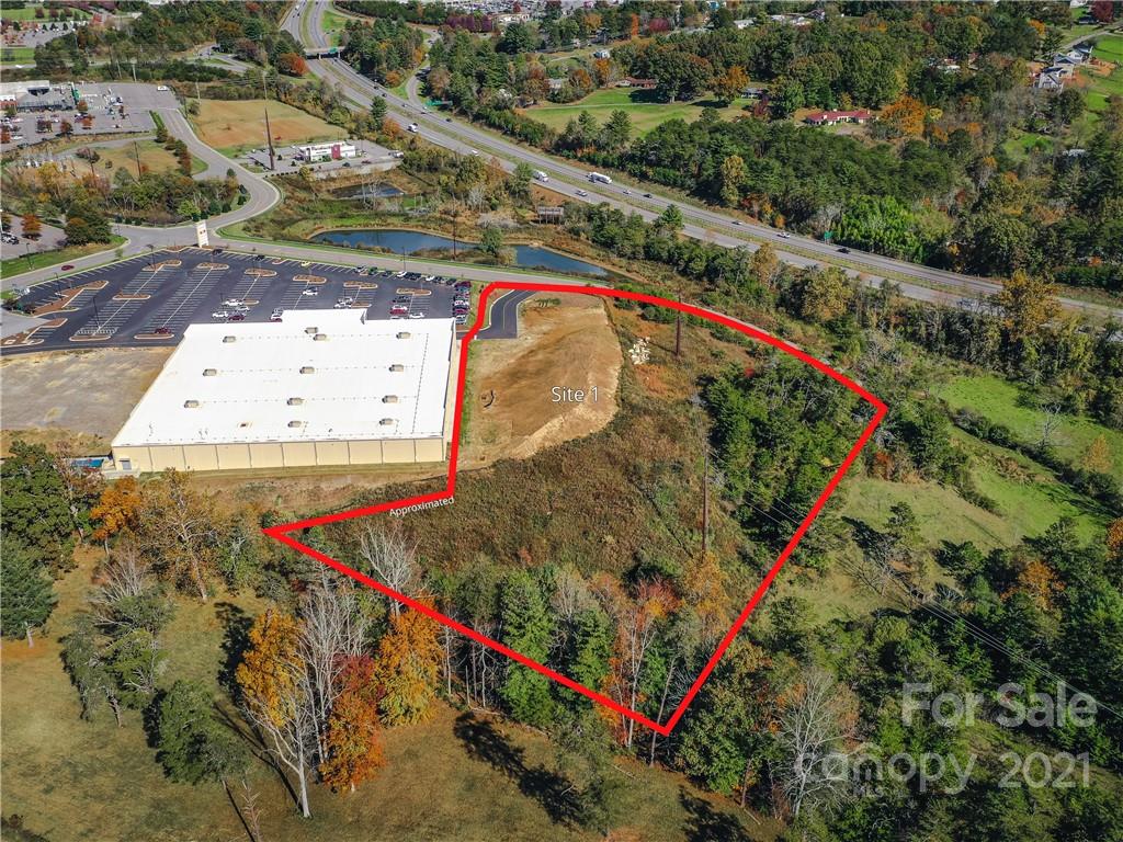 Parcel #1 of four outparcels within the Northridge Commons Shopping Center.  This site is 4.53 acres adjacent to the recently developed Hobby Lobby, Marshalls, and Dollar General.  Northridge Commons also is supported by numerous nationally branded anchor tenants including Lowes, Walmart Supercenter, Sonic, and Gamestop.  Access is immediately off of I-26 with a traffic count of 50,000+ via Weaver Blvd with a traffic count of 18,904.  Site #1 would be ideal for a hotel or other commercial development. New adjacent DR Horton Community breaking ground with 296 apartments, 172 Single Family and Townhomes, and 100 Casitas.
