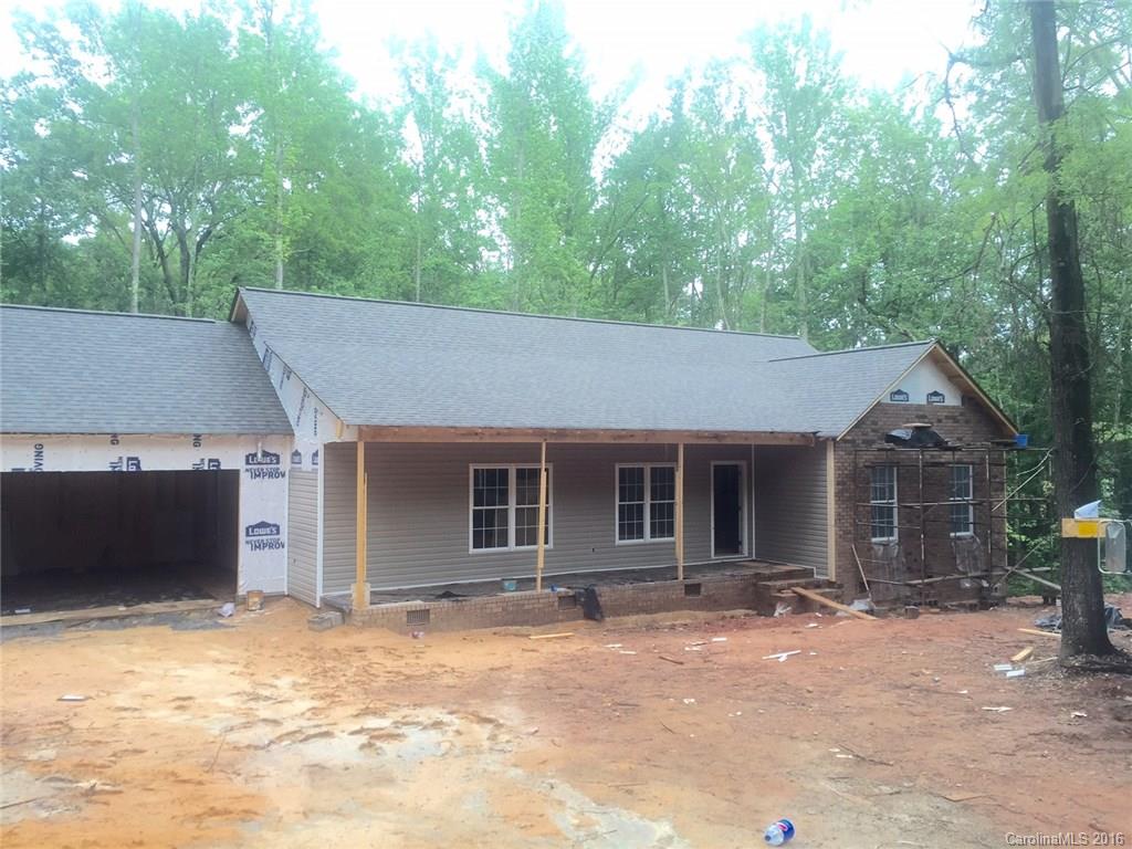 New Construction &  still available options to pick as well as appliances, custom built cabs, 3 Bdrm, 2 bath split floor plan on over 1 acre, wooded and in the Clover School District. Home has a great covered front porch and a beautiful covered back deck overlooking the wooded lot w/ the privacy of nature. Must see- it will not last. In sheetrock stage. Master has beautiful tray ceiling & Great room has a vaulted ceiling.  Bonus room w-separate door leading off to the deck as well, 2 car garage