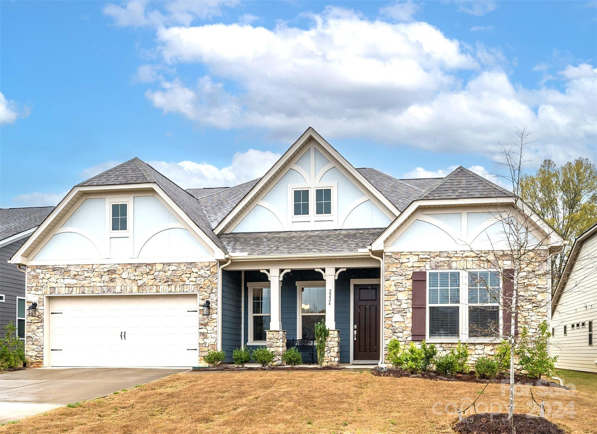 Only relocation makes this beautiful, almost new home available. This spacious home offers a split plan with 3 bedrooms/2 baths on the main level, an open concept floor plan with a large family room w/FP, casual dining area, stunning kitchen with a unique boomerang-shaped center island. A dedicated "formal" dining area can be used as a home office/study/or den. Upstairs you'll find 2 add'l bedrooms, full bath, and game room or study room.  Primary bedroom on main level features an expansive walk-in shower, dual sinks, large walk-in closet. Flex room on main level can be a nursery, office, study room, craft room...whatever your family needs. Home features upgraded cabinets, quartz countertops, DR tray ceiling, upgraded lighting. Rear covered porch and paver patio complete the exterior.