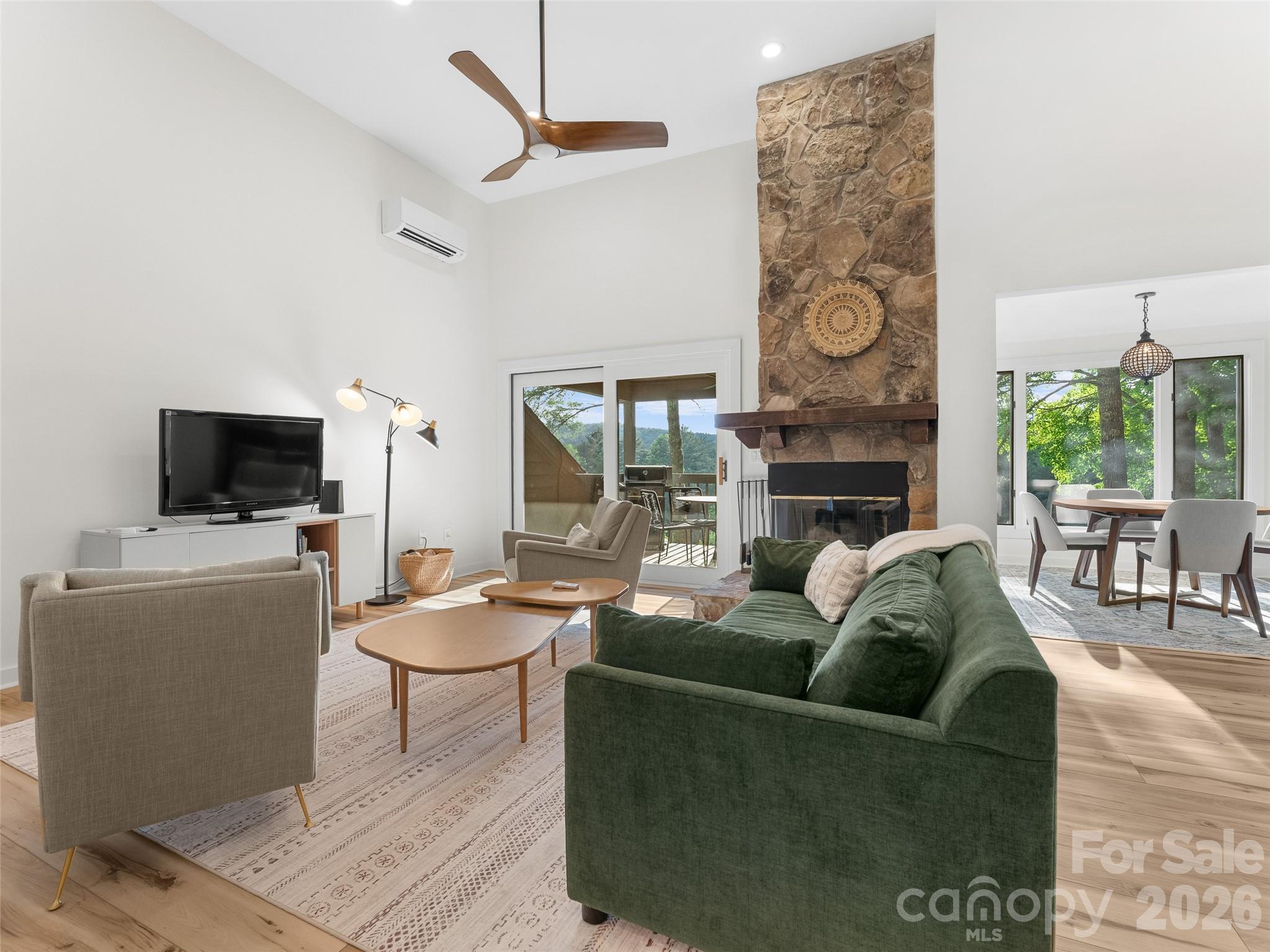 Turn-key mountain-view condo offering low-maintenance living in the heart of Burlingame. This beautifully updated 2-bedroom, 2-bath residence features an open floor plan with vaulted ceilings and abundant natural light throughout.
Recent updates include new cabinetry, countertops, appliances, vanities, lighting, flooring, and tile, creating a stylish modern feel from top to bottom. The main living area is centered around year-round mountain views and a stunning stone fireplace, providing the perfect setting for relaxing or entertaining.
Situated at approximately 3,000 feet in elevation, you'll enjoy cooler summer temperatures, peaceful surroundings, and spectacular sunsets over the Blue Ridge Mountains from the covered back porches. The west-facing exposure showcases the changing colors of the mountains throughout the seasons.
Most furniture and personal property are available for purchase, making this an exceptional move-in-ready opportunity.
Conveniently located near the Burlingame Country Club, this sought-after community offers something for everyone, including a renowned golf course, clubhouse, waterfall/ riverfront park with private fishing waters on the Horsepasture River, tennis and pickleball courts, picnic areas, and abundant green space. Owners in Racquet Club Villas enjoy easy access to Burlingame's tennis and pickleball facilities, enhancing the active mountain lifestyle.